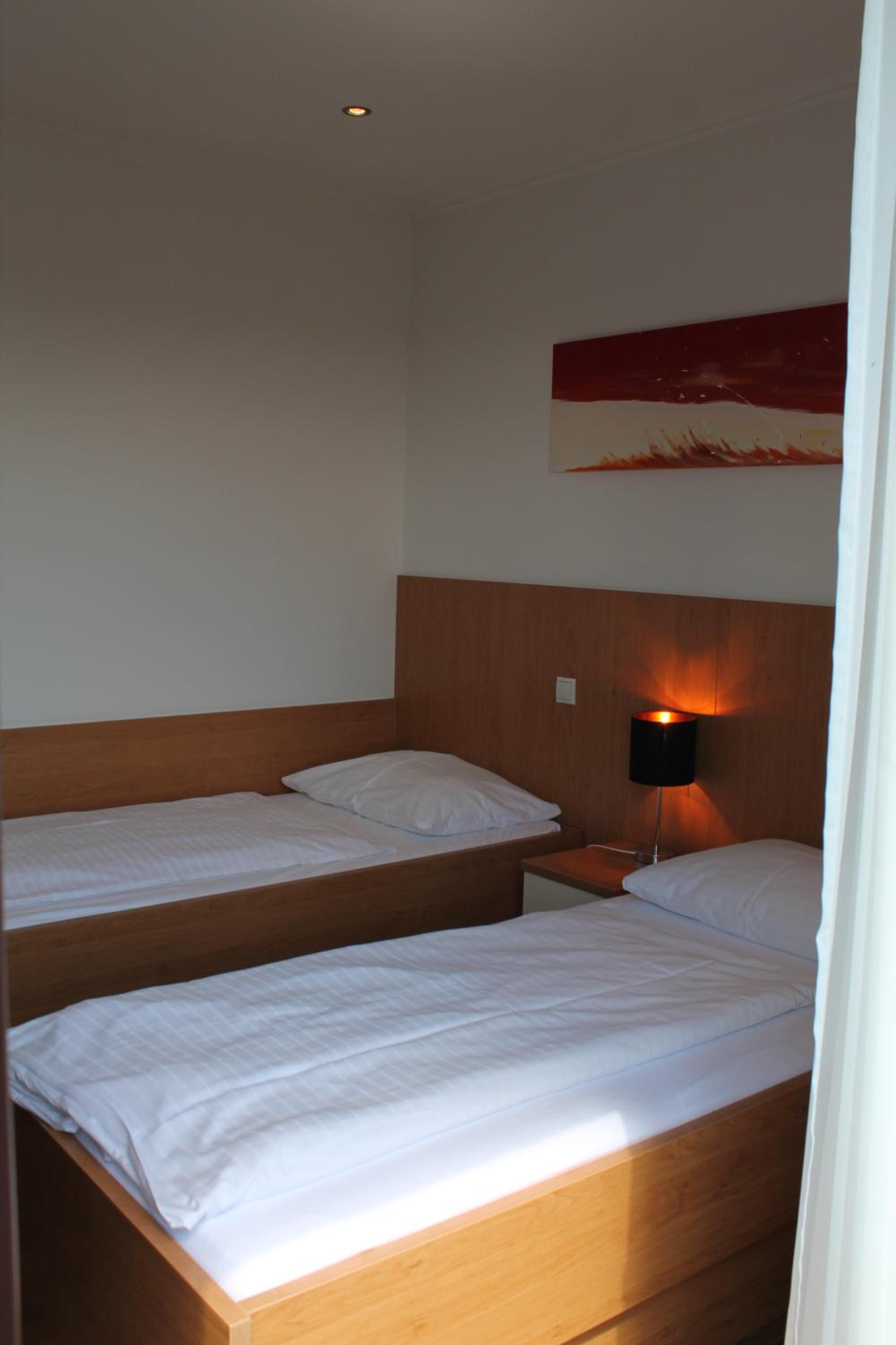 Pension Steinbichler - Apartments und Zimmer Check in 24-7