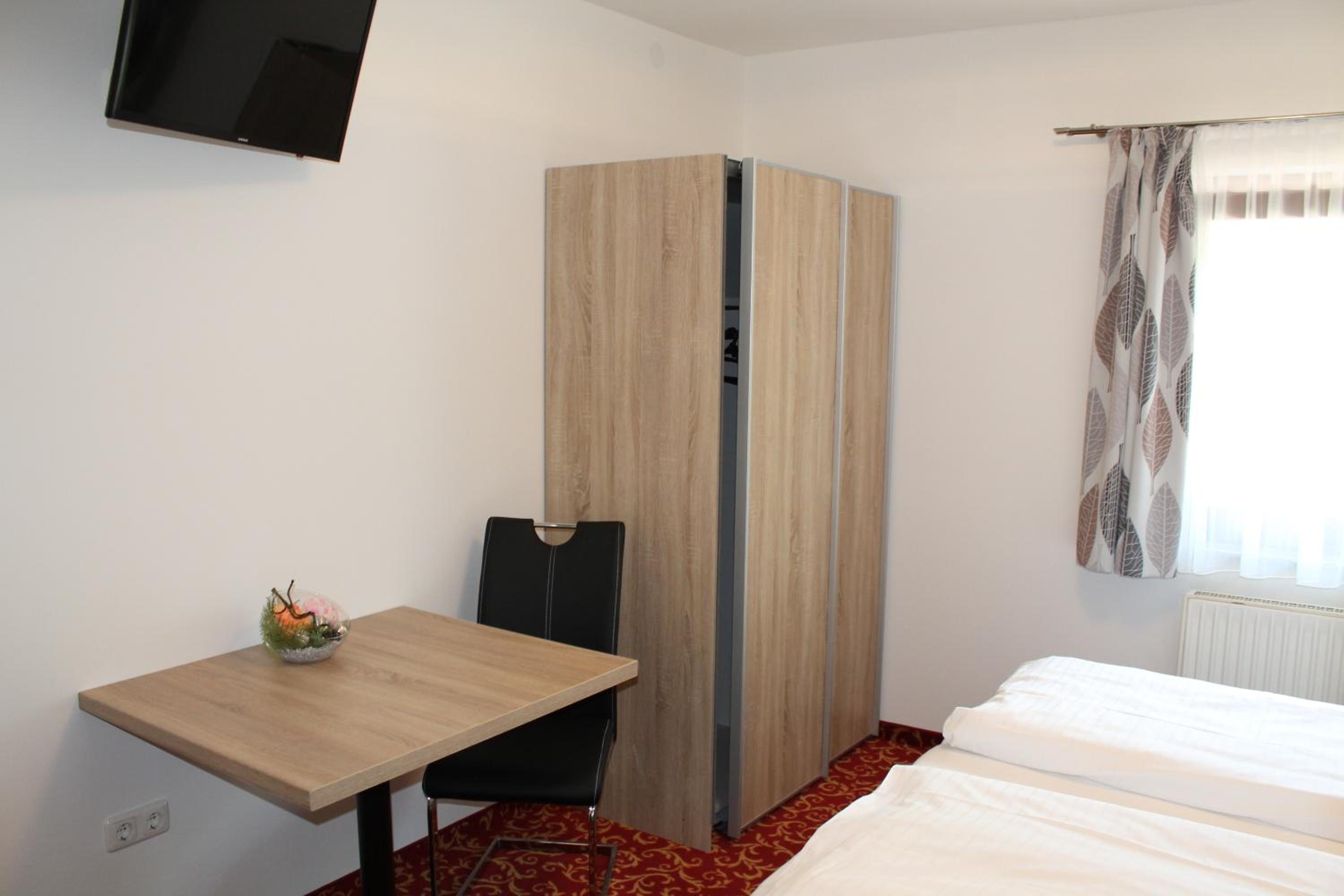 Pension Steinbichler - Apartments und Zimmer Check in 24-7