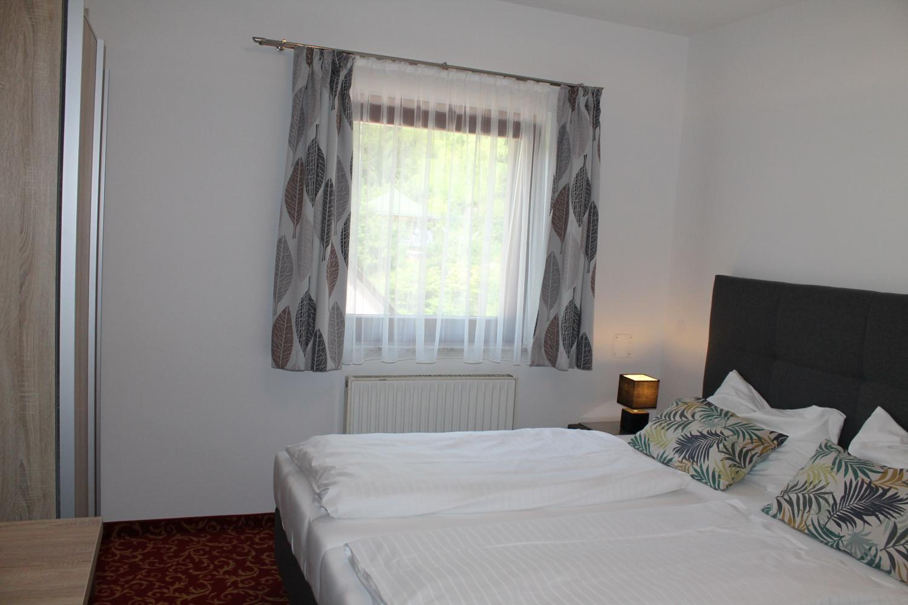 Pension Steinbichler - Apartments und Zimmer Check in 24-7