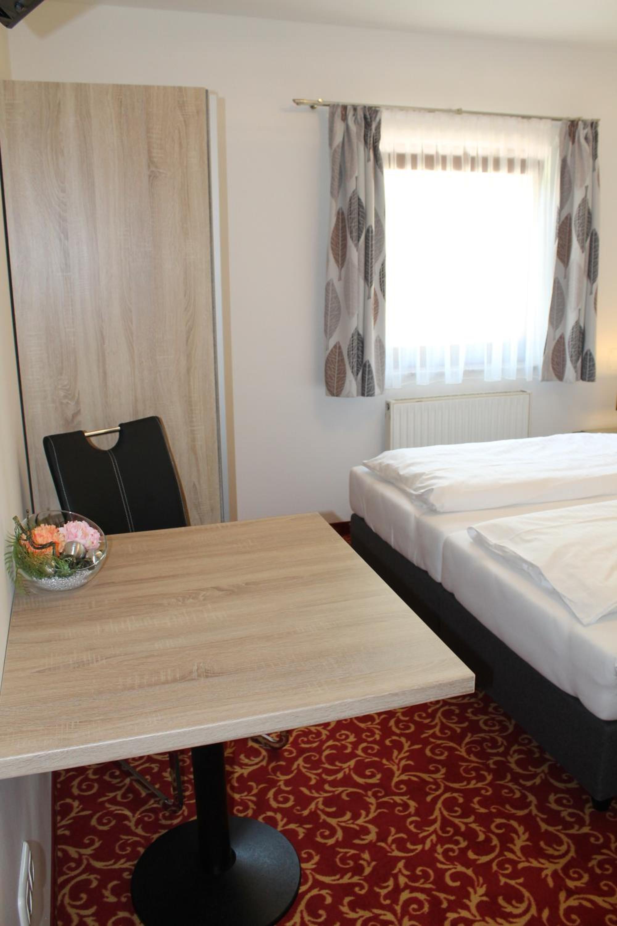 Pension Steinbichler - Apartments und Zimmer Check in 24-7