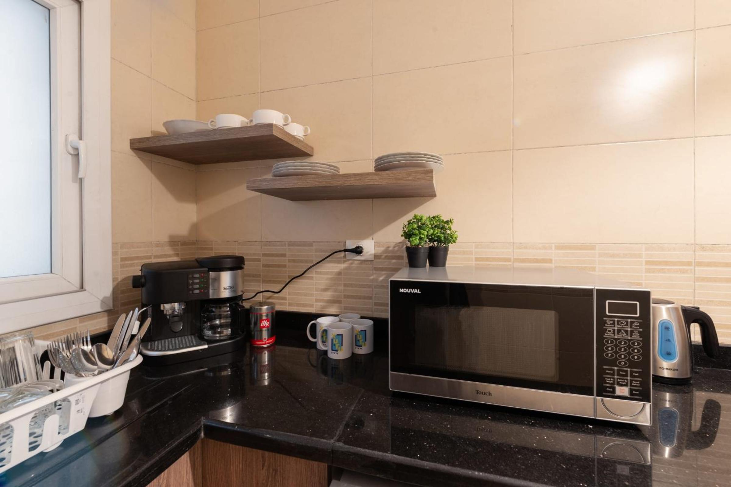 The 2BDR Compelling Condo 5 min to CAI Airport