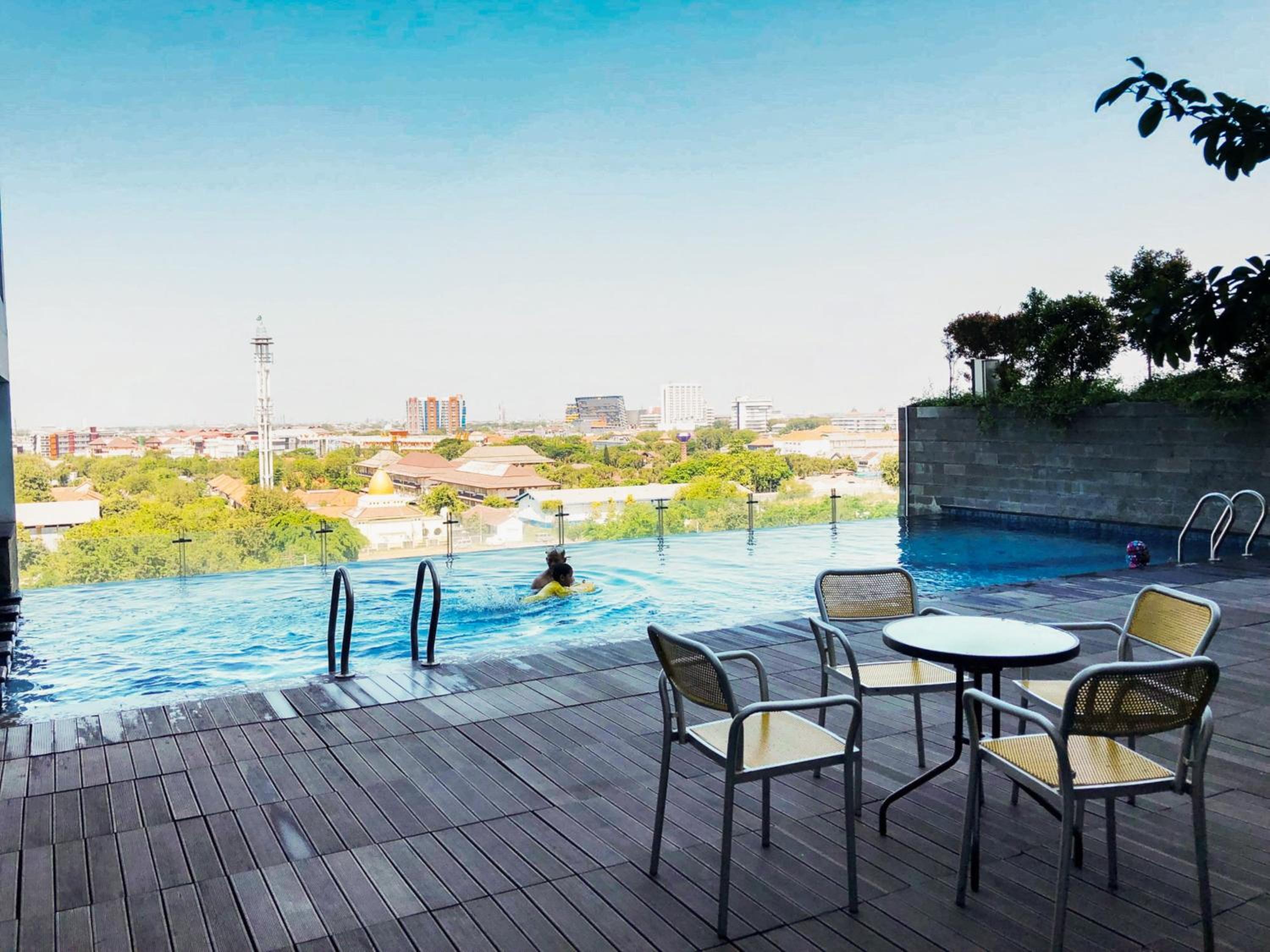 Best View 2BR Apartment at Tamansari Papilio By Travelio