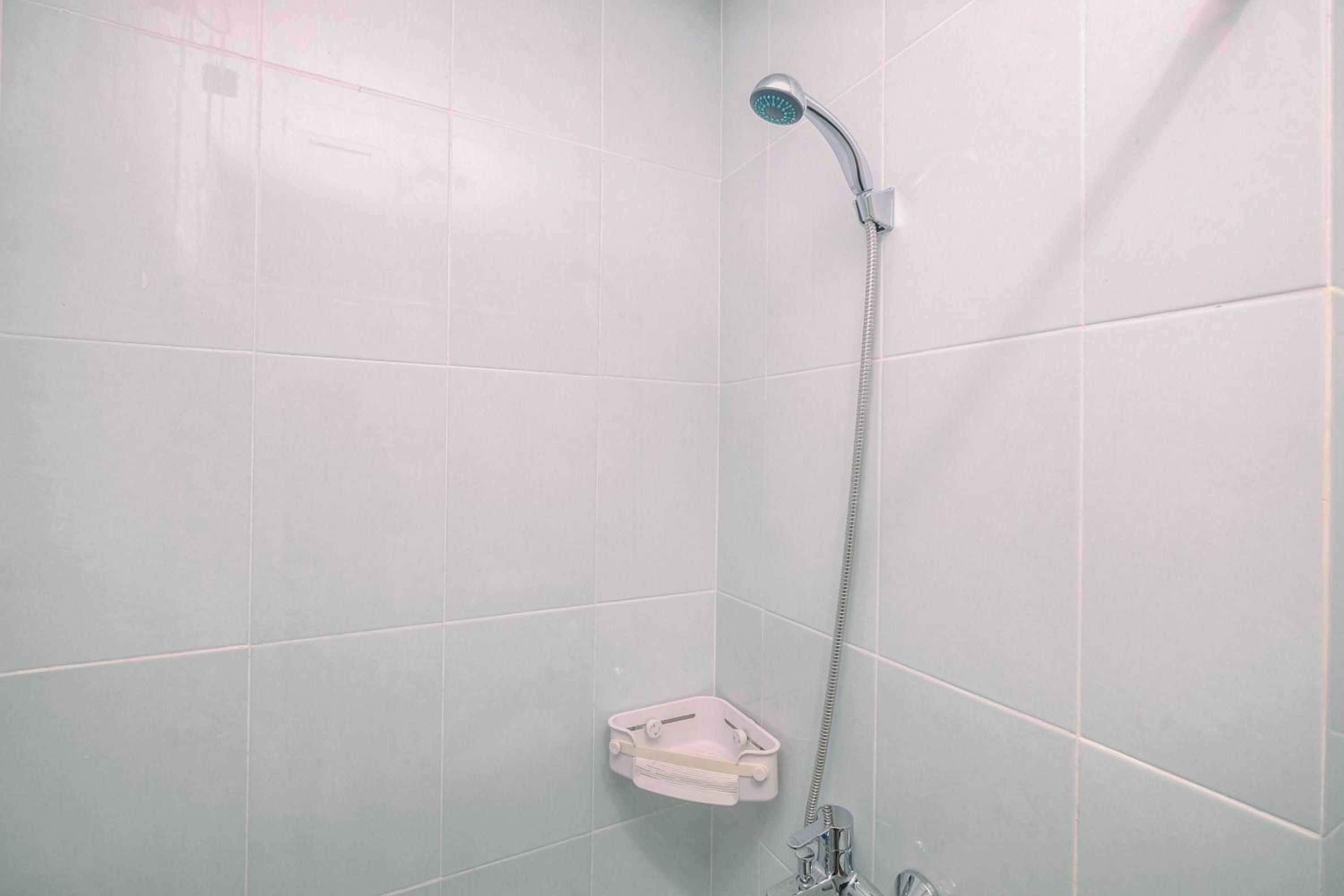 Comfy and Minimalist 1BR Patraland Urbano Apartment near Bekasi Station By Travelio
