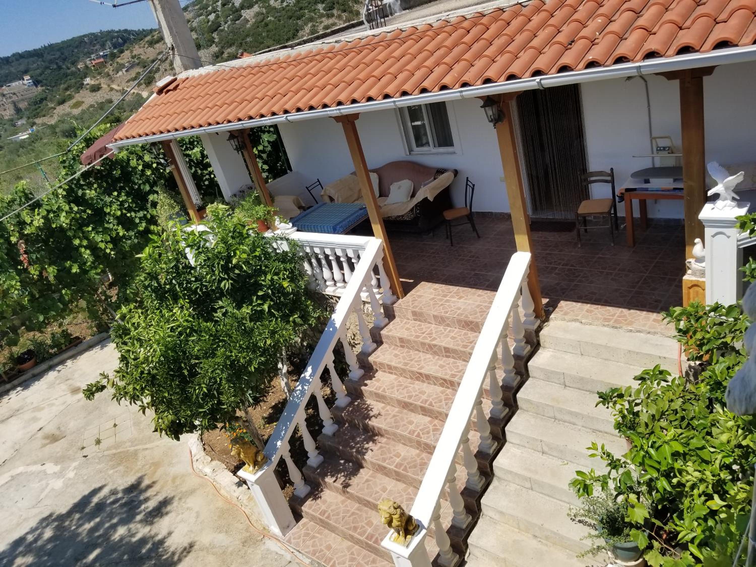 Denaj House