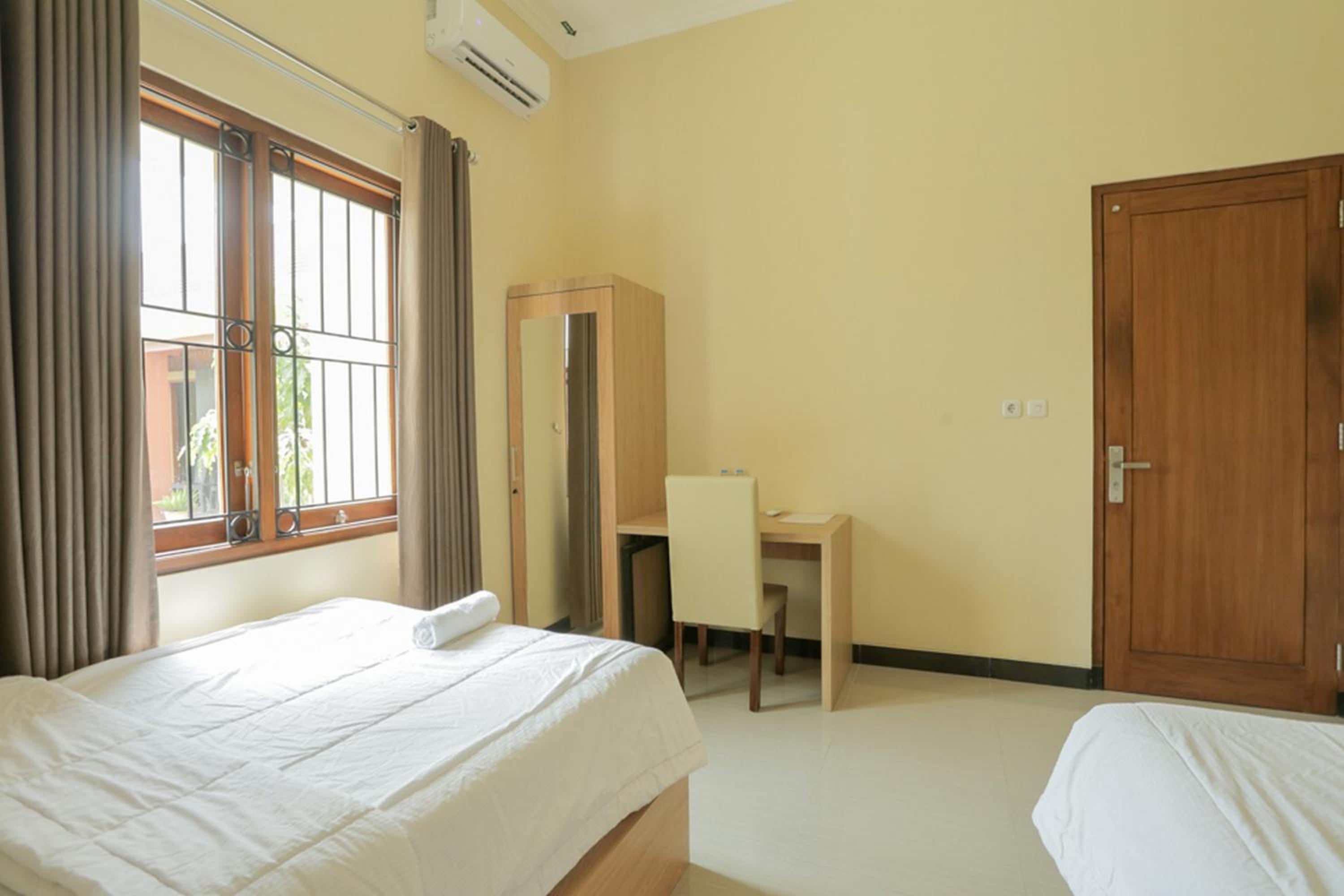 Solo Vacations - IDR Green Guest House Syariah Mitra RedDoorz - Property Image 43