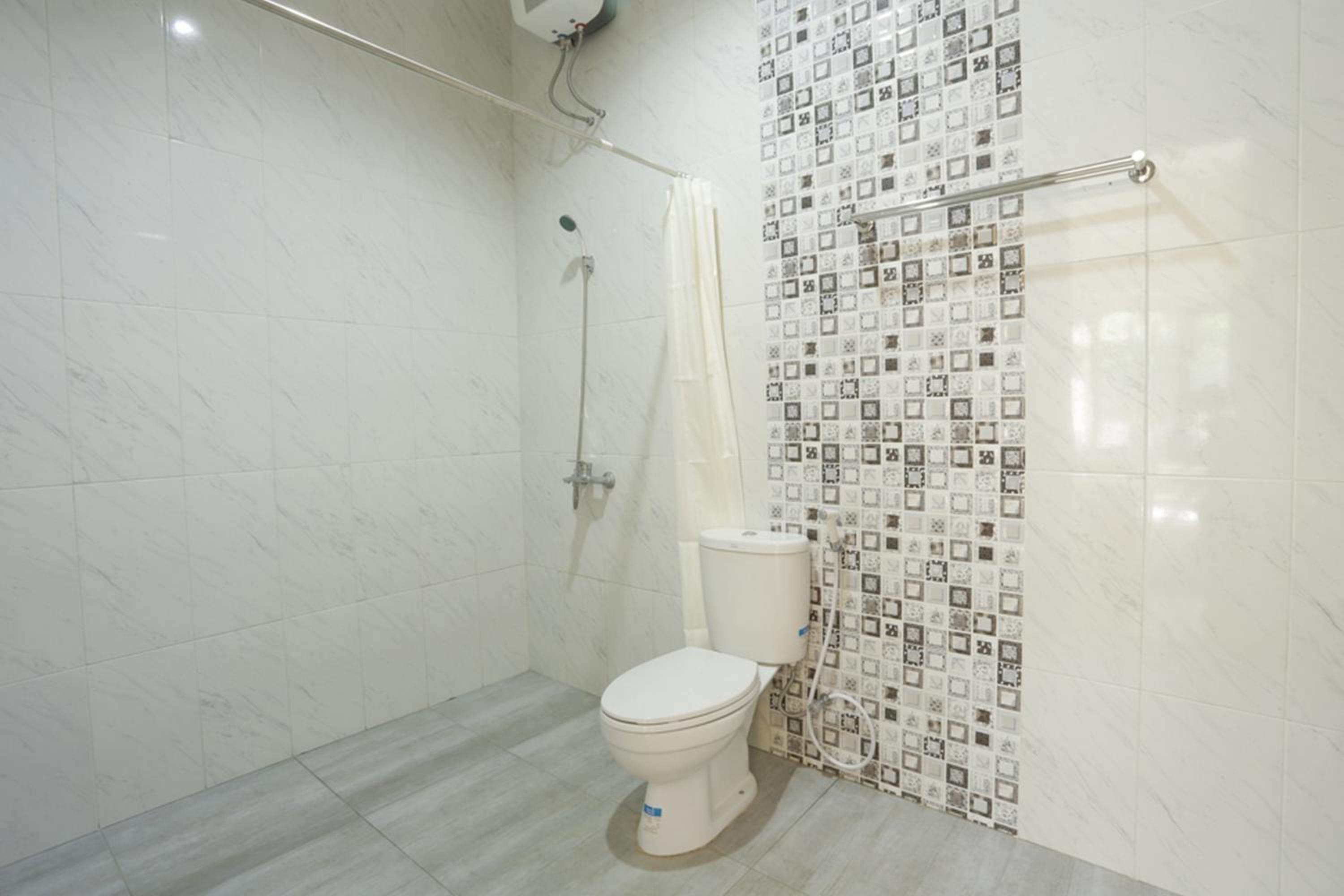 Solo Vacations - IDR Green Guest House Syariah Mitra RedDoorz - Property Image 69