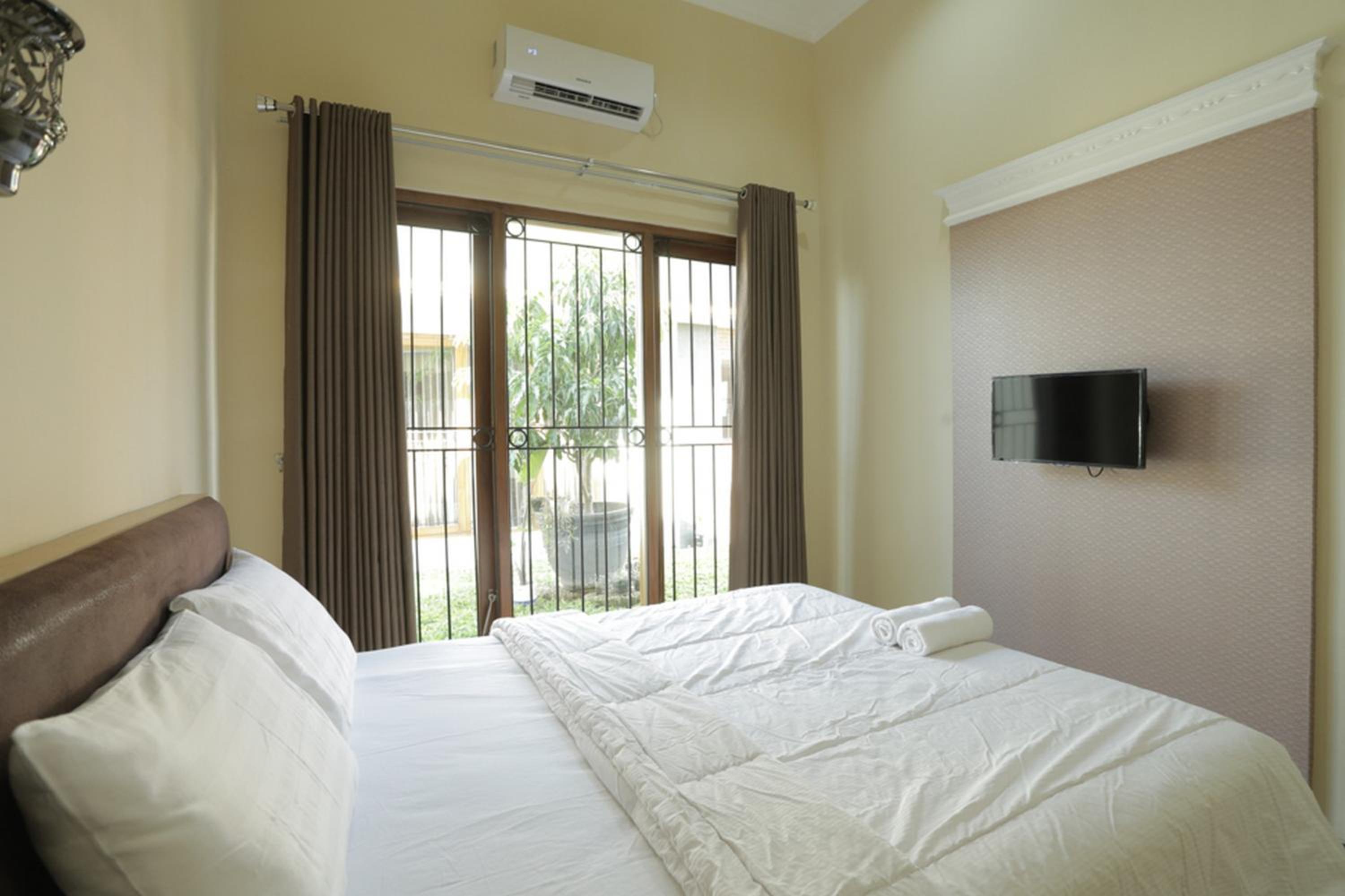 Solo Vacations - IDR Green Guest House Syariah Mitra RedDoorz - Property Image 65