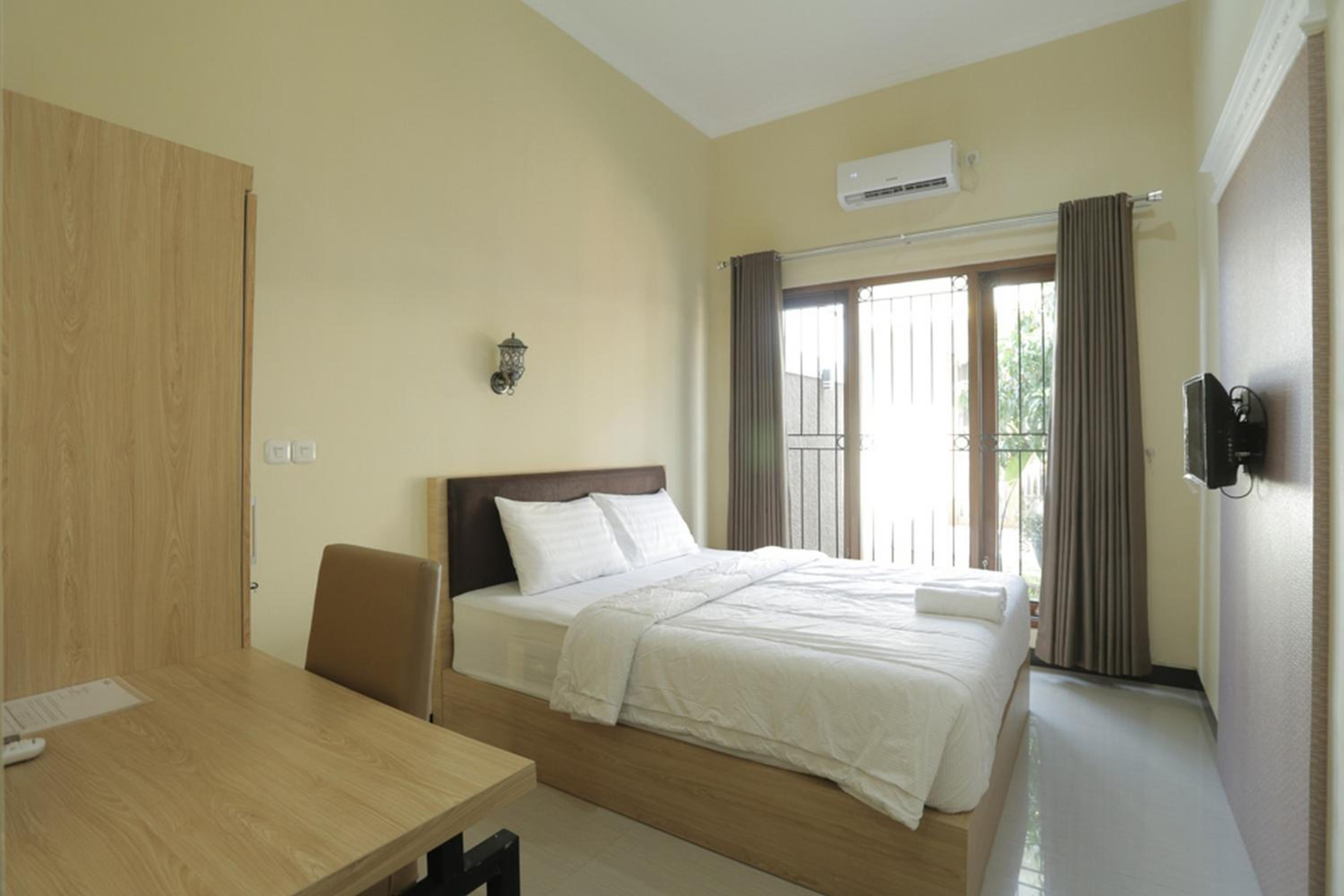 Solo Vacations - IDR Green Guest House Syariah Mitra RedDoorz - Property Image 64