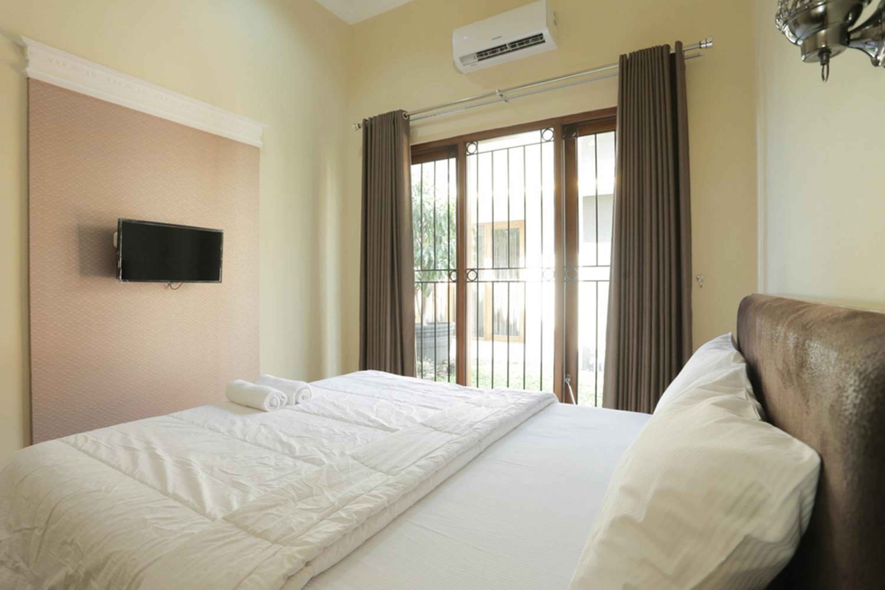 Solo Vacations - IDR Green Guest House Syariah Mitra RedDoorz - Property Image 20