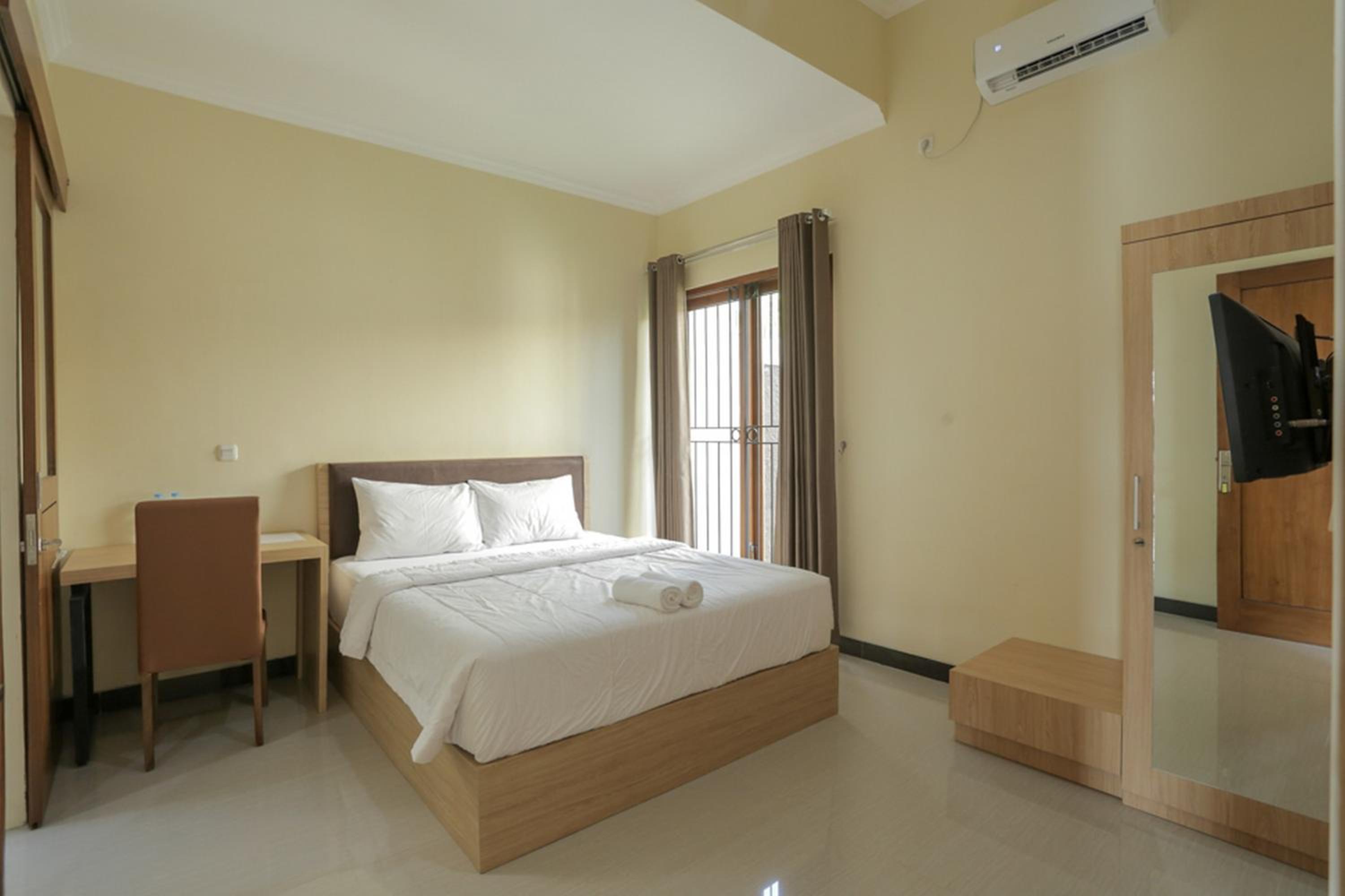 Solo Vacations - IDR Green Guest House Syariah Mitra RedDoorz - Property Image 40