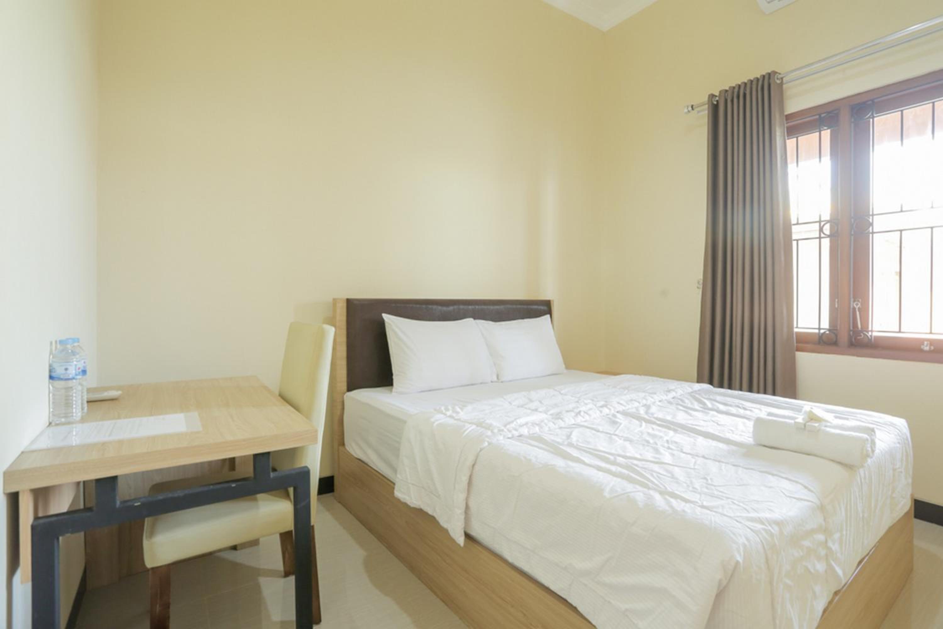 Solo Vacations - IDR Green Guest House Syariah Mitra RedDoorz - Property Image 33