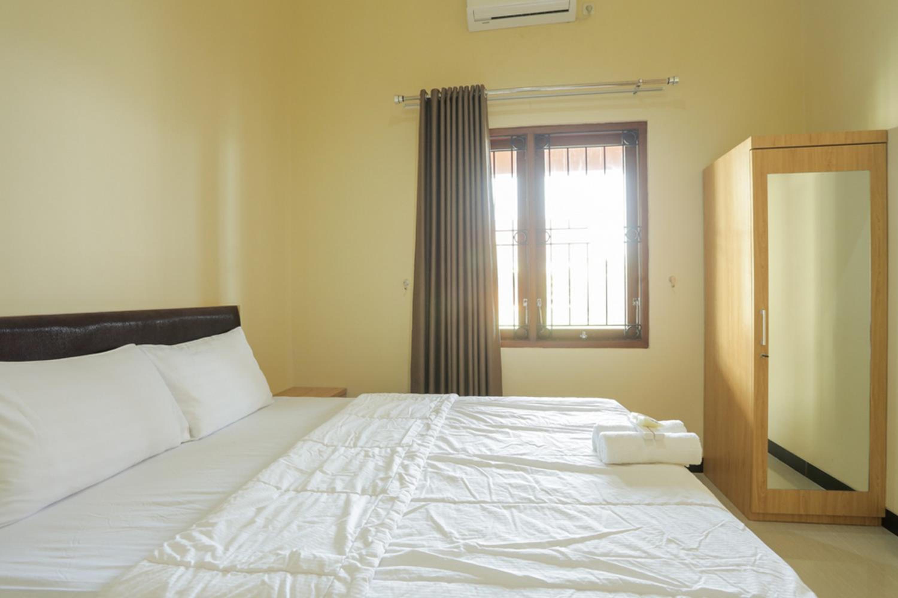 Solo Vacations - IDR Green Guest House Syariah Mitra RedDoorz - Property Image 32