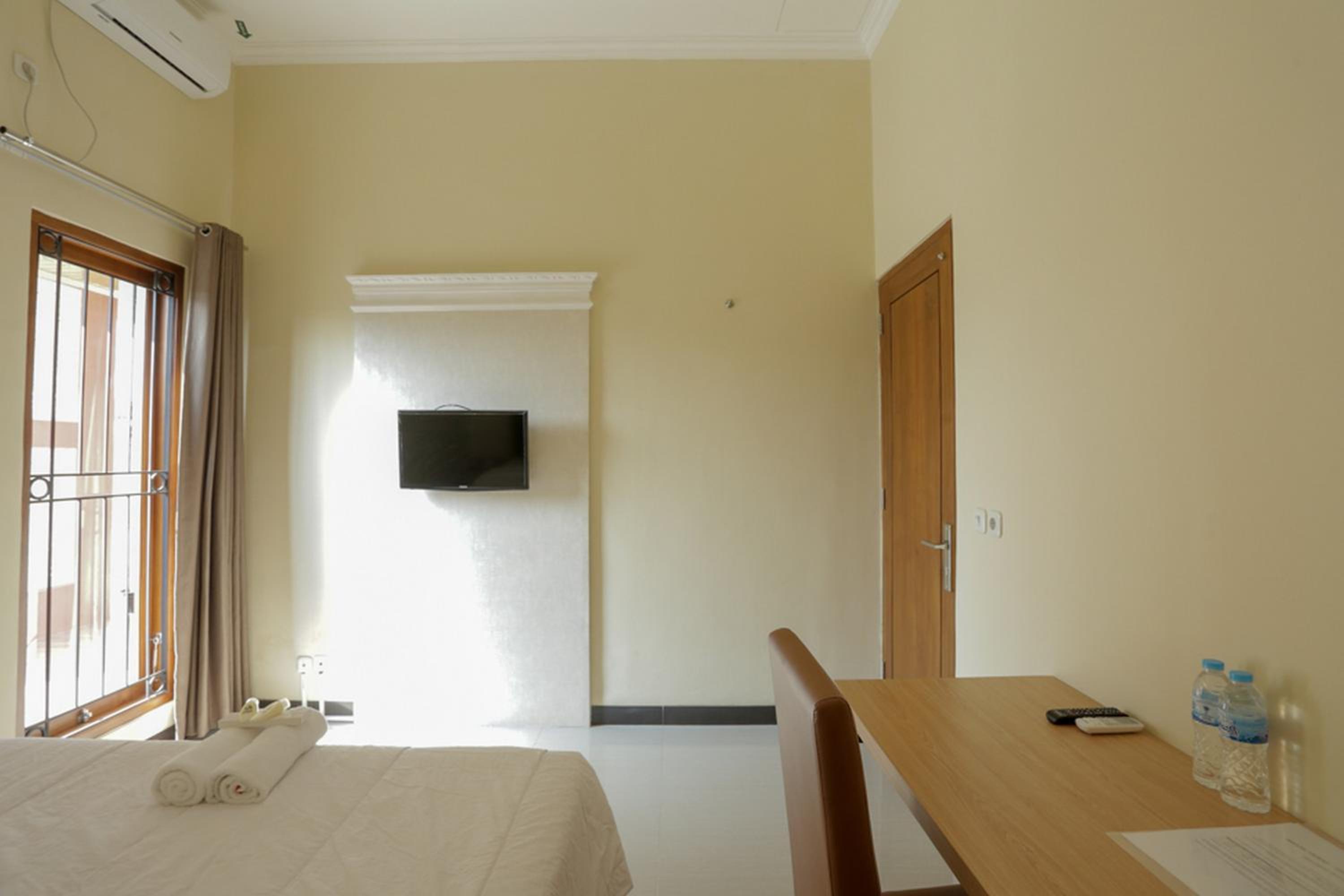 Solo Vacations - IDR Green Guest House Syariah Mitra RedDoorz - Property Image 27