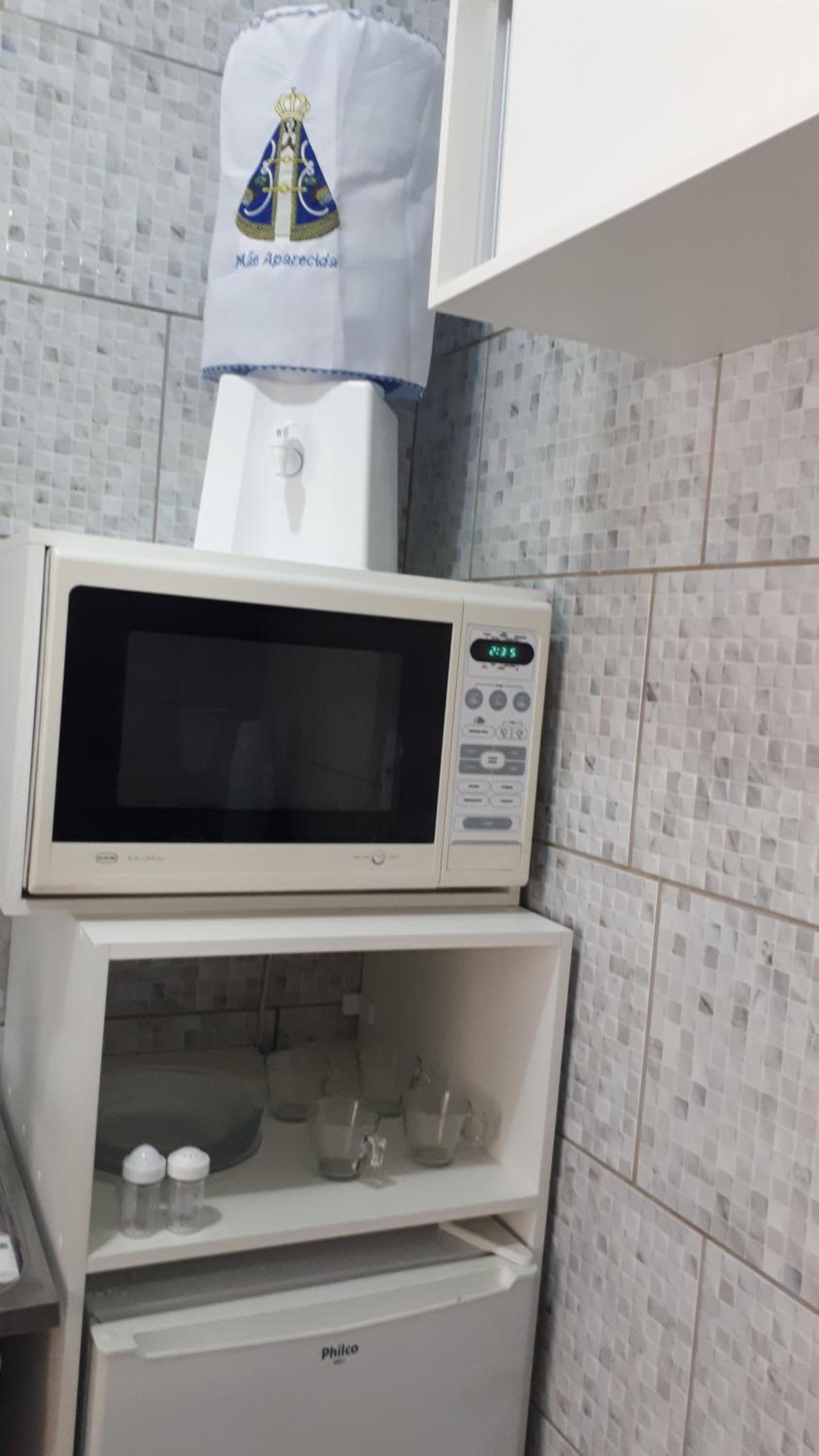 Flat familiar com ar,wi fi,cozinha e garagem