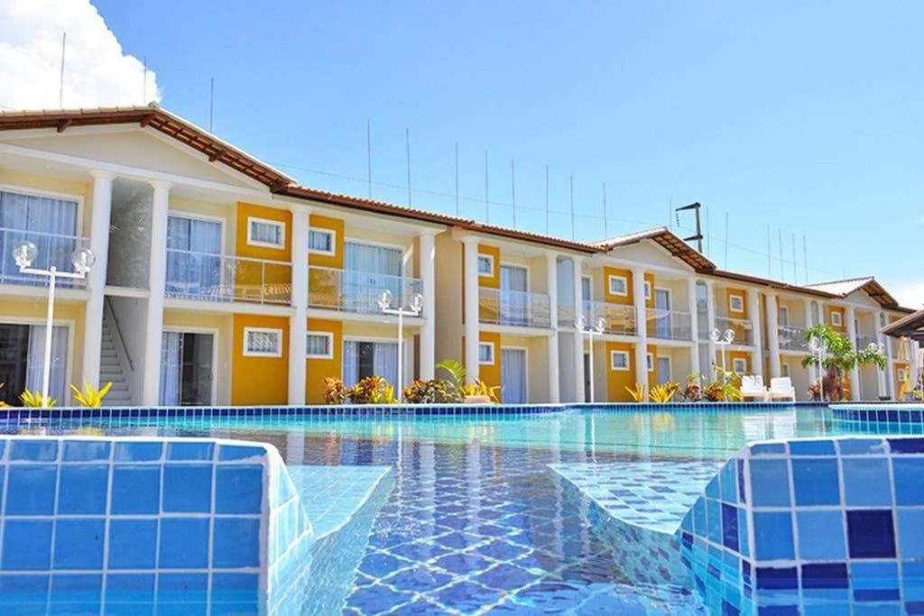 Hotel Apartamento no condomínio Mont Carmelo a 150 metros do mar - Image 1