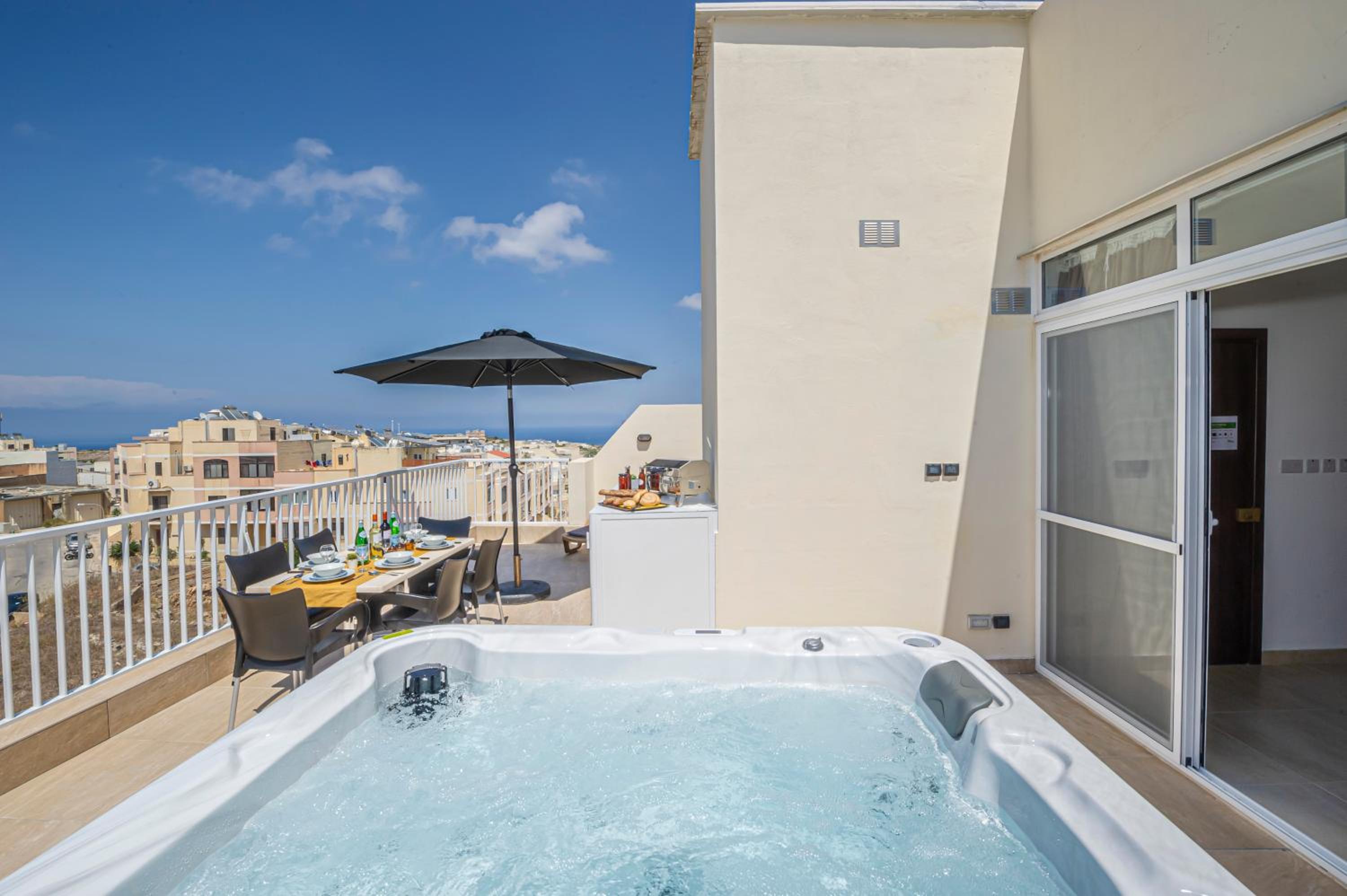 Summer Breeze Penthouse with private Hot Tub & terrace with panoramic views, by Getawaysmalta view 5
