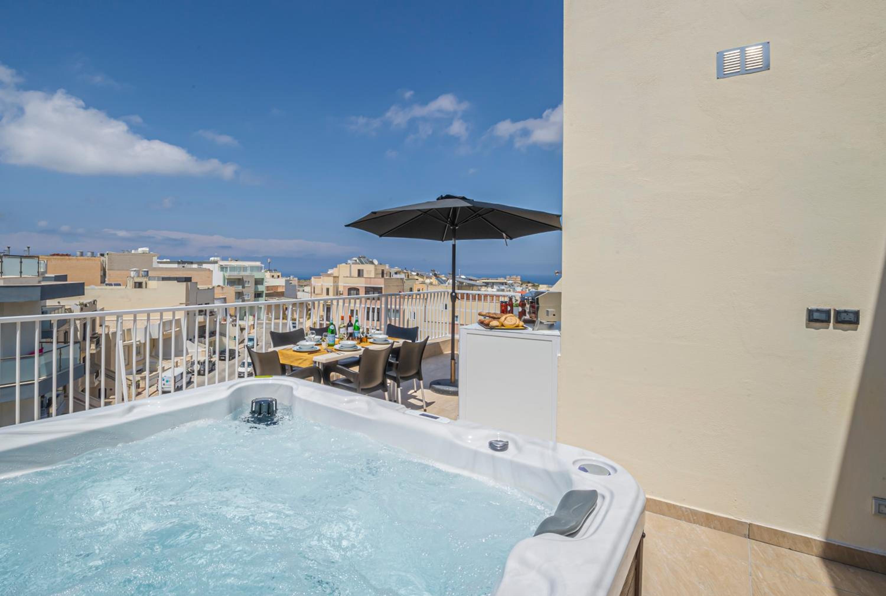 Summer Breeze Penthouse with private Hot Tub & terrace with panoramic views, by Getawaysmalta view 3