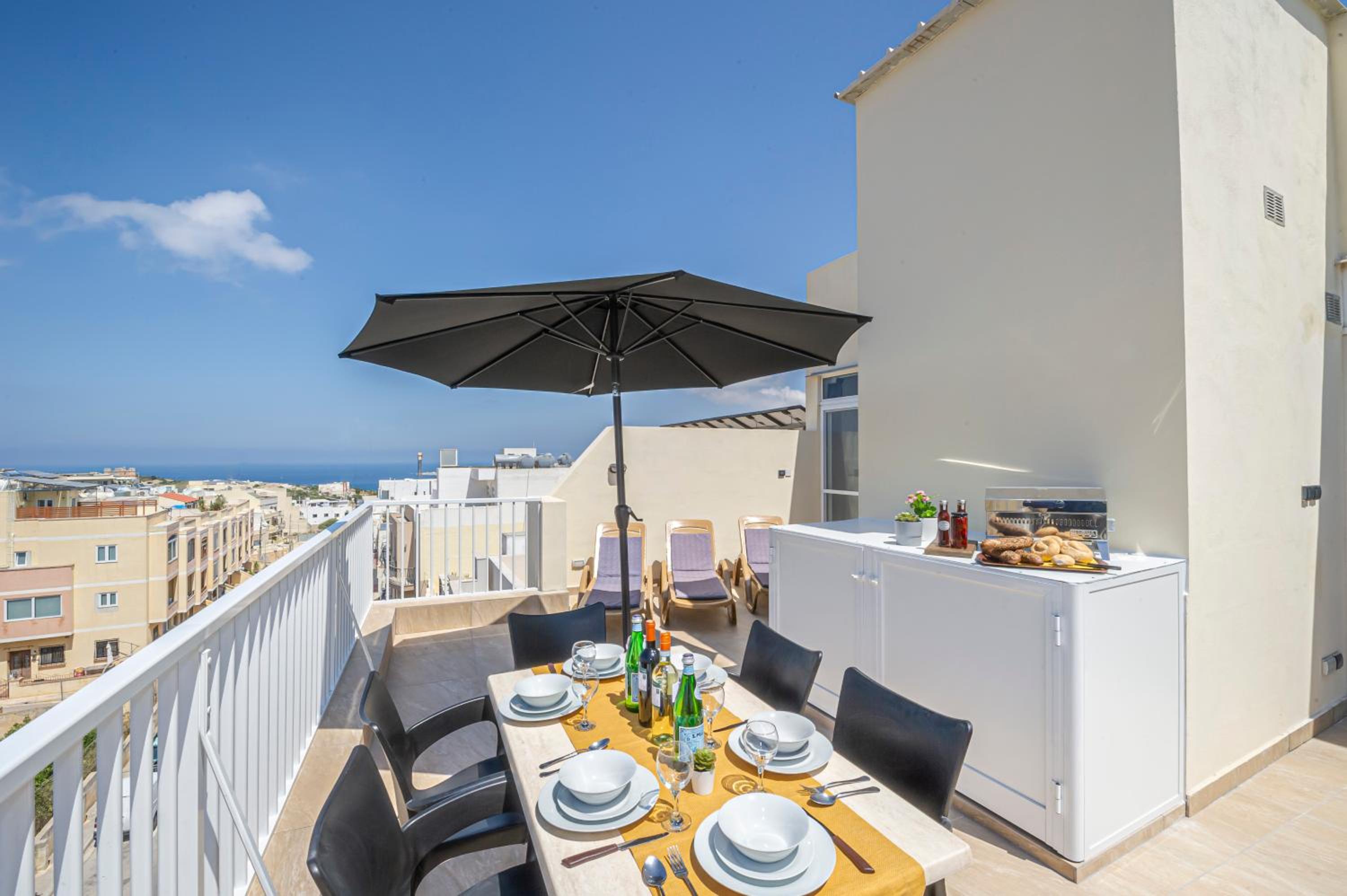 Summer Breeze Penthouse with private Hot Tub & terrace with panoramic views, by Getawaysmalta view 4