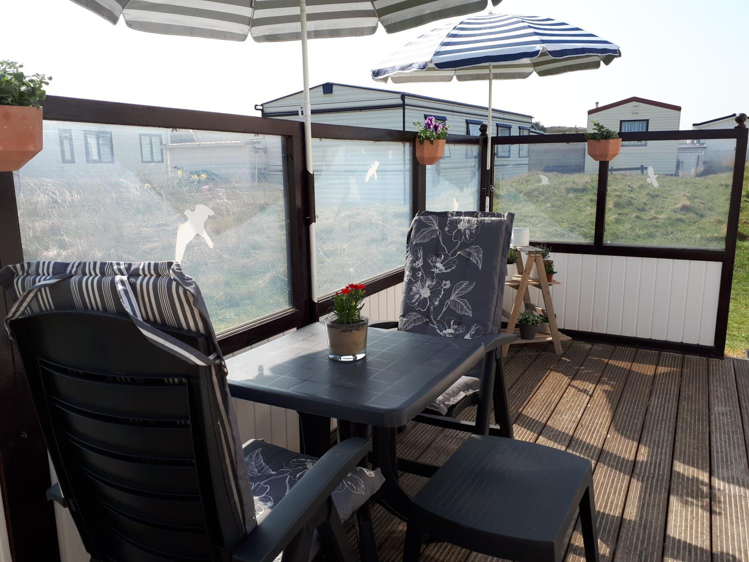 AMELAND-Nes-Duinoord: Stacaravan (chalet) + fietsen direct aan zee! view 5