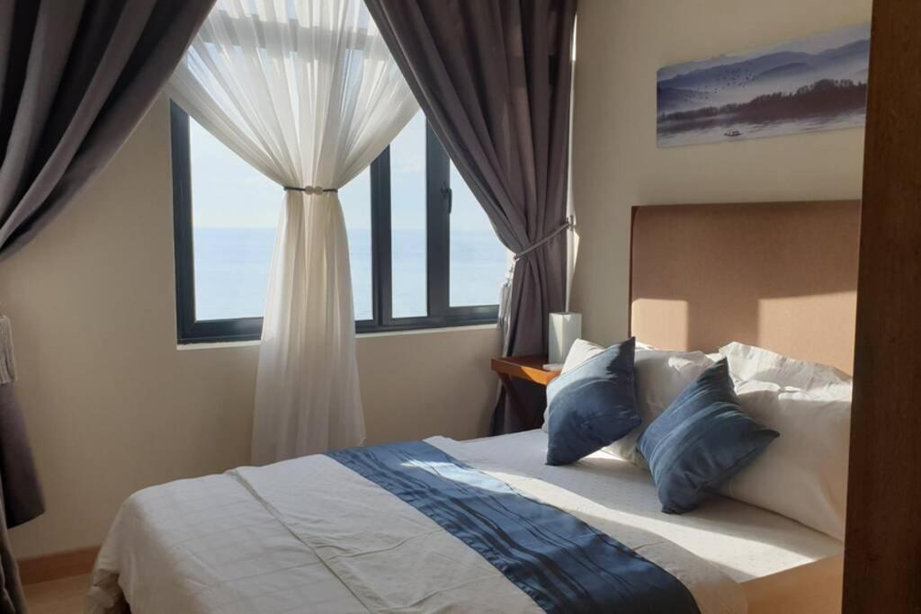 OPAHOME@ Timurbay Seafront Residence 2BR Family suite Seaview and Poolview photo 3