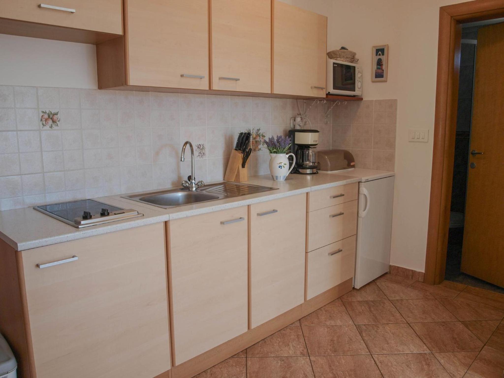 Kristi apartment complex near the sandy beach - by TA Leut Agency view 3