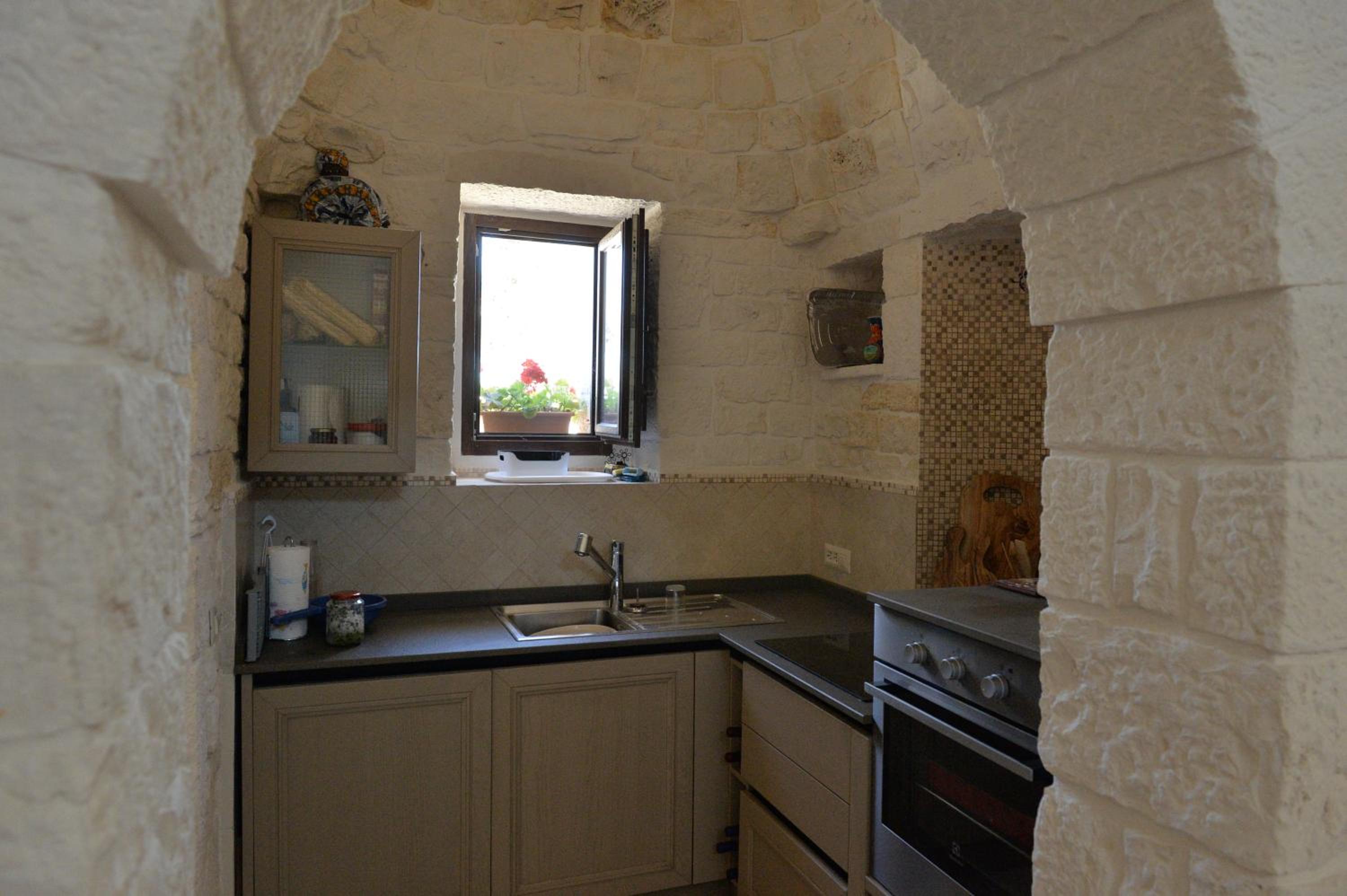 TD Truly Trulli Gentle Breezes Across Olive Valley view 3