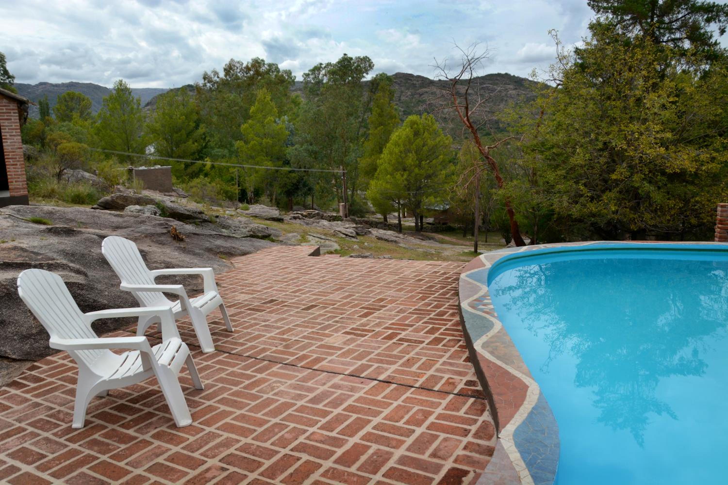 LA TOMA Complejo de Montaña - Cabañas y Habitaciones en Hosteria