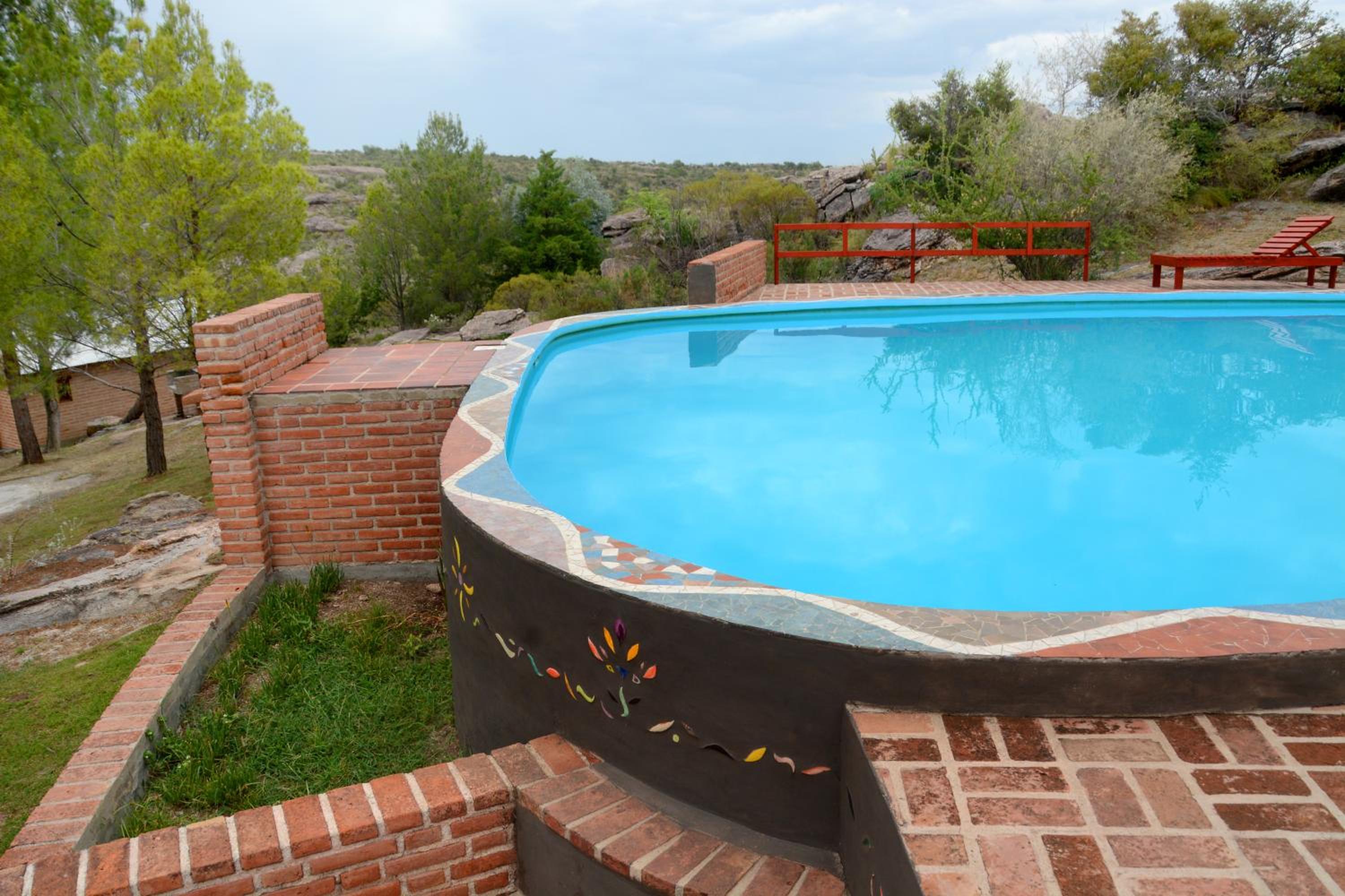 LA TOMA Complejo de Montaña - Cabañas y Habitaciones en Hosteria