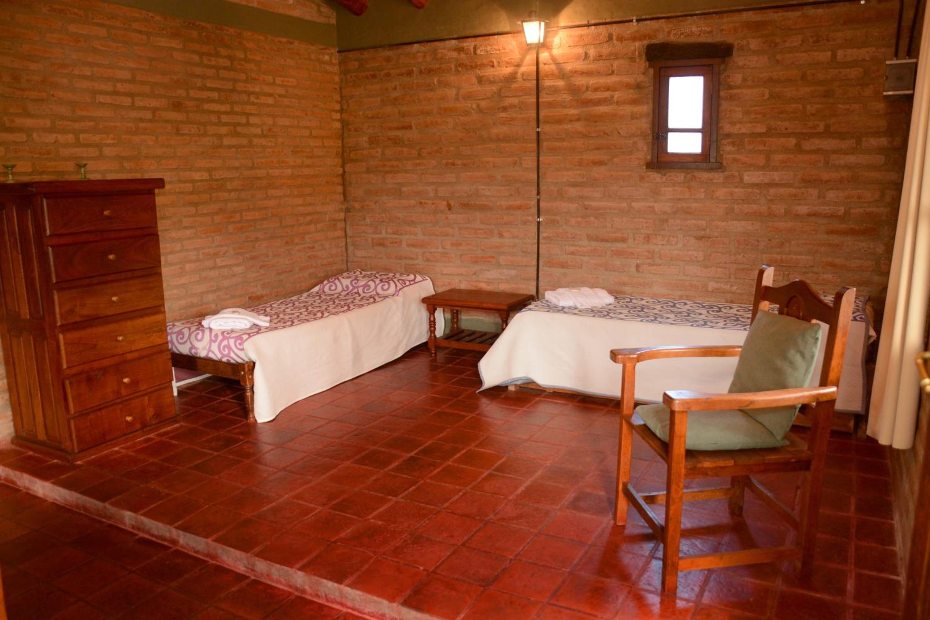 LA TOMA Complejo de Montaña - Cabañas y Habitaciones en Hosteria
