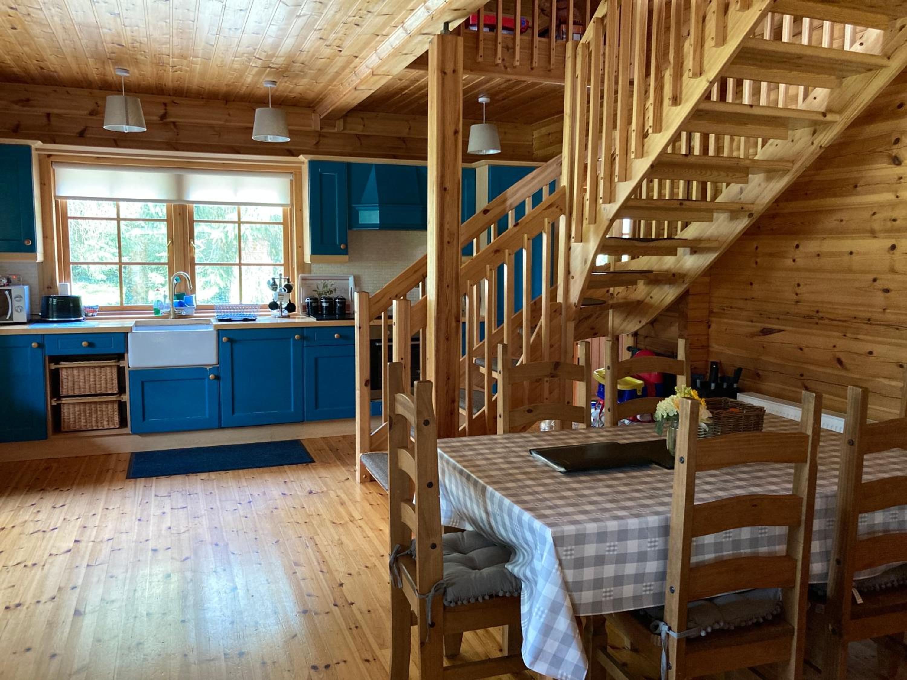 Riverside log cabin view 2