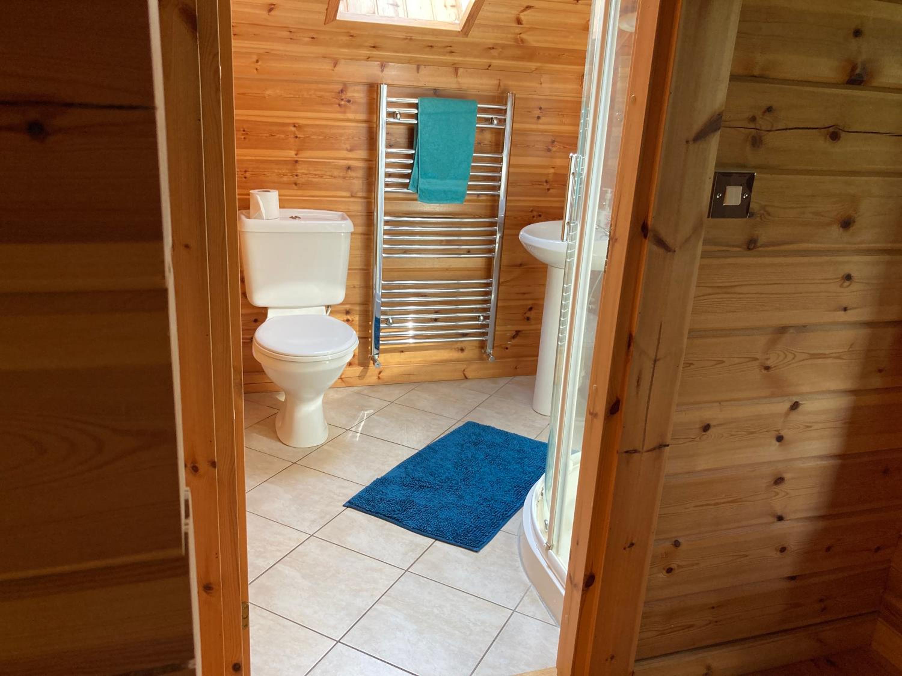 Riverside log cabin view 4