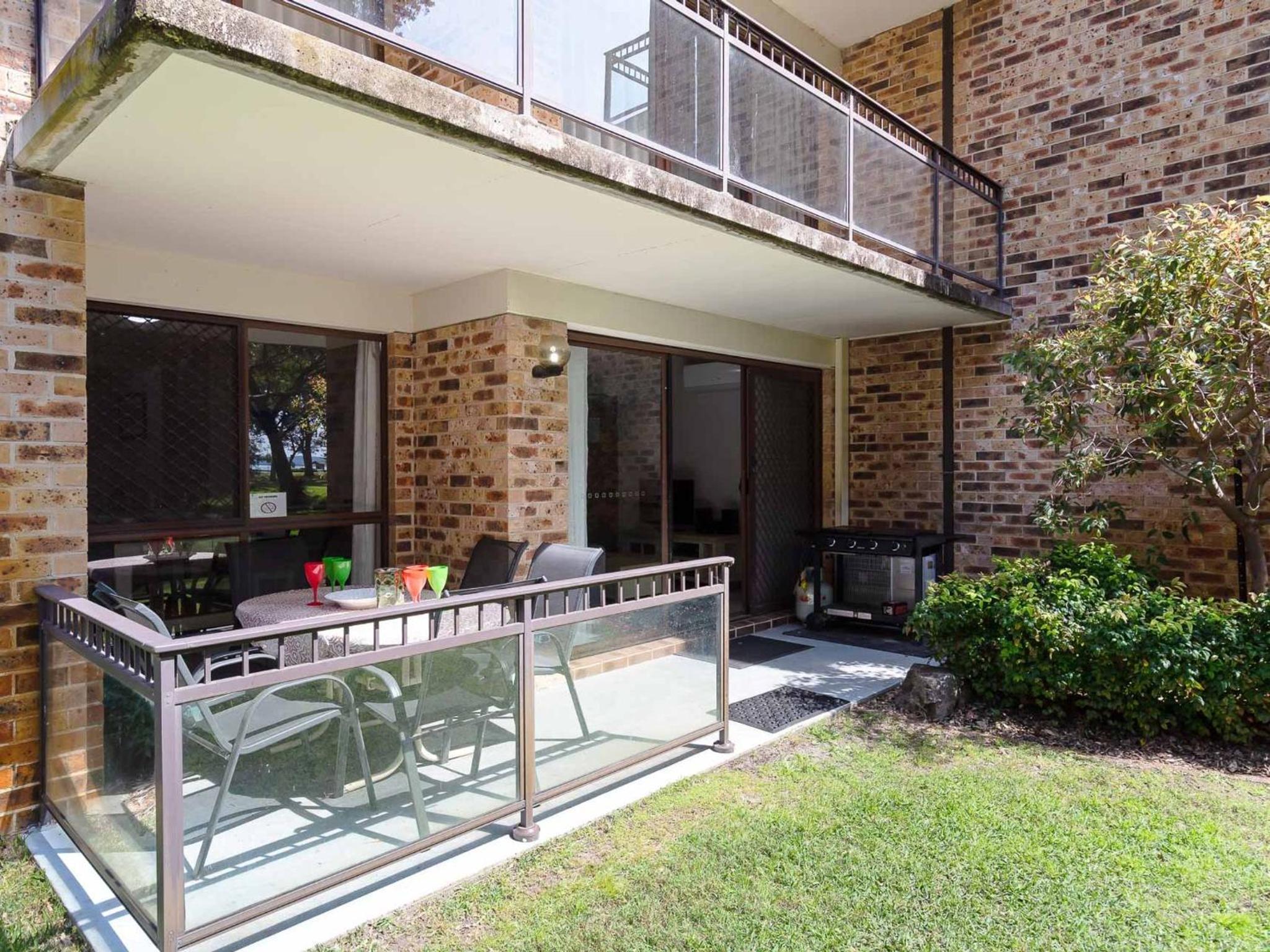 Bay Parklands 57 ground floor unit with pool tennis court and aircon