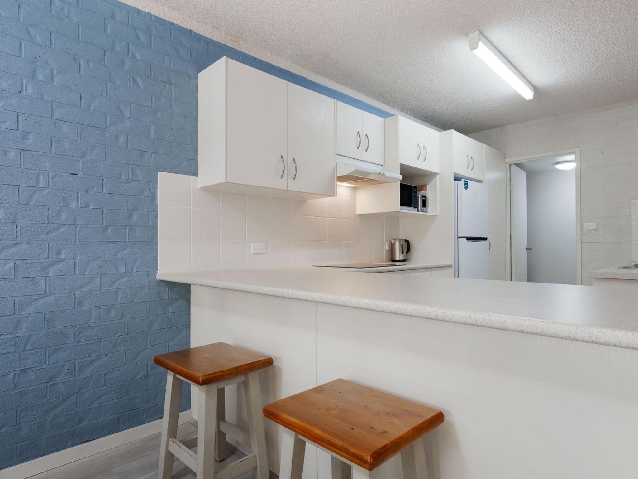Bay Parklands 57 ground floor unit with pool tennis court and aircon