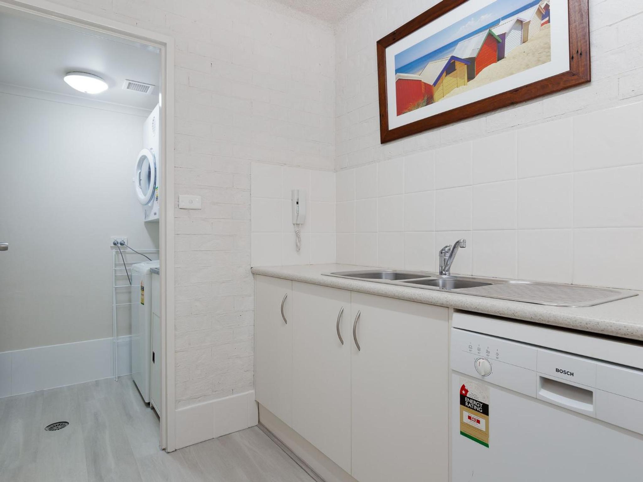 Bay Parklands 57 ground floor unit with pool tennis court and aircon
