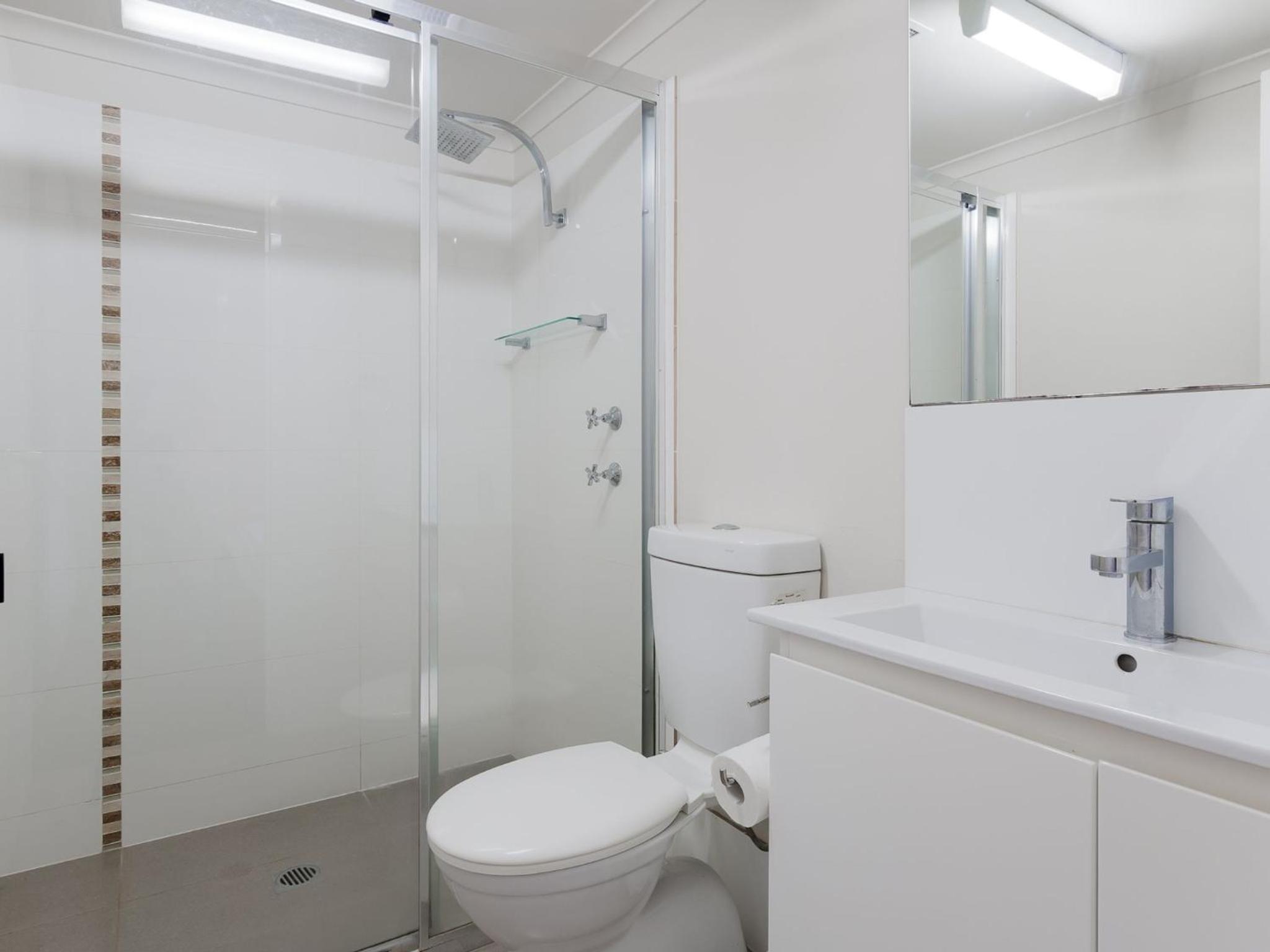 Bay Parklands 57 ground floor unit with pool tennis court and aircon