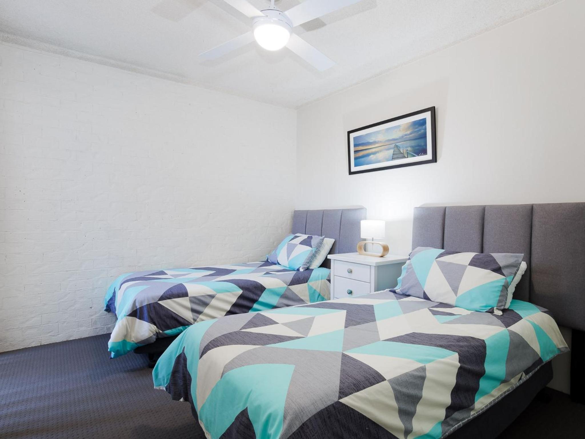 Bay Parklands 57 ground floor unit with pool tennis court and aircon