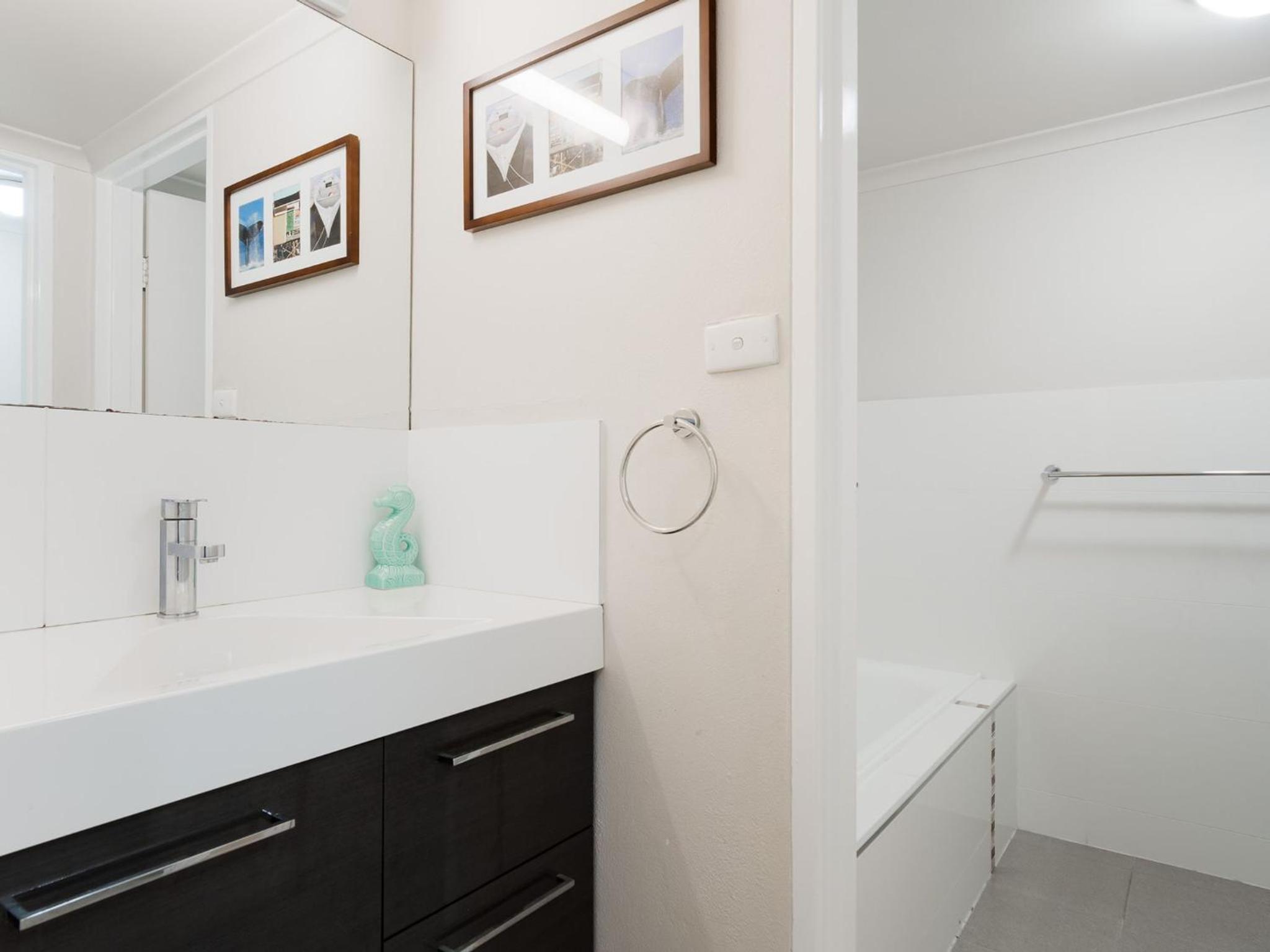 Bay Parklands 57 ground floor unit with pool tennis court and aircon