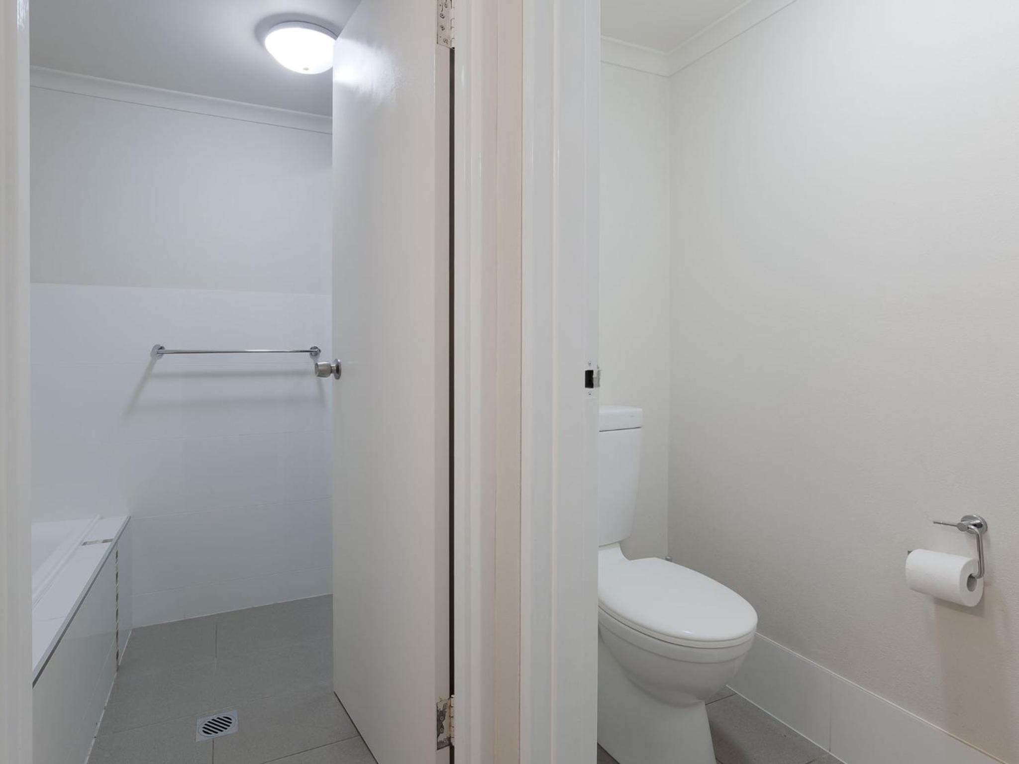 Bay Parklands 57 ground floor unit with pool tennis court and aircon