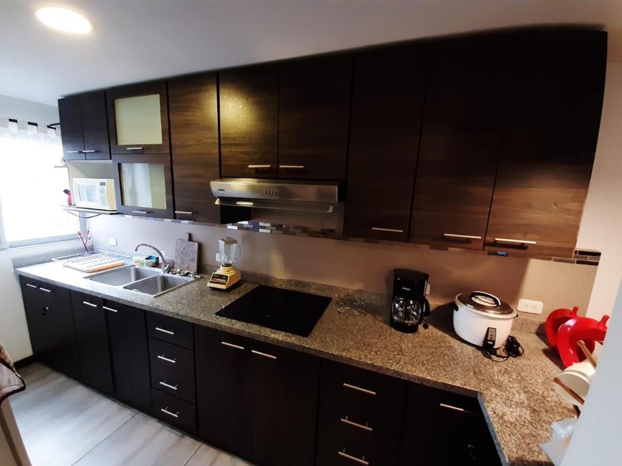 Moderno departamento en Condominio Providencia view 2