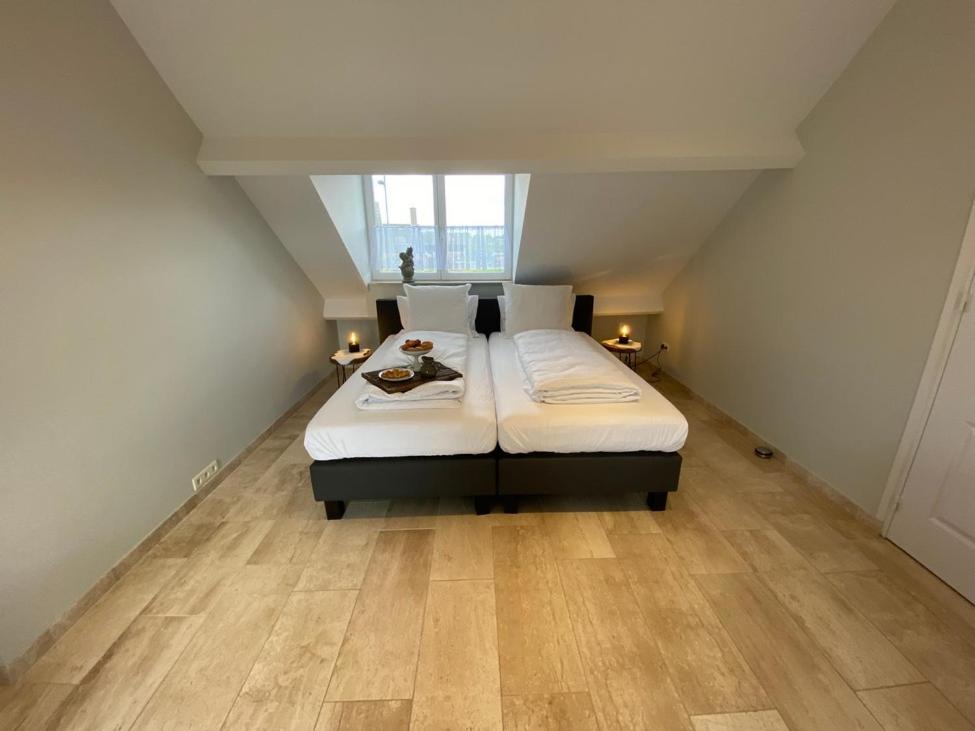 Den 118, aan de Maas
