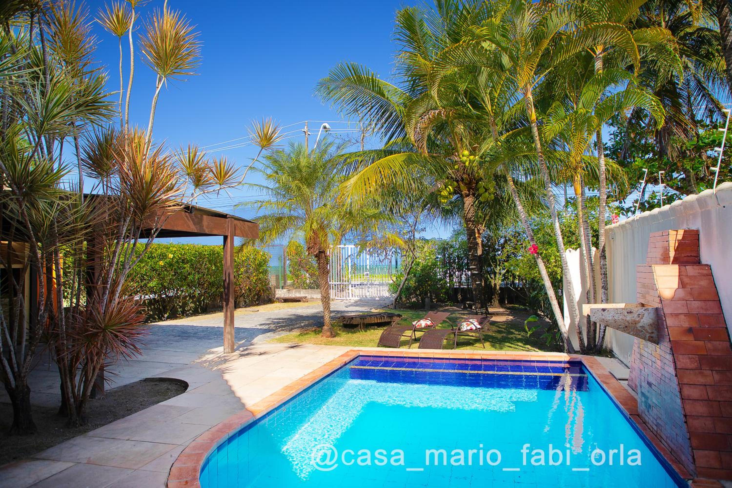 Casa temporada em frente a praia piscina privativa churrasqueira view 5