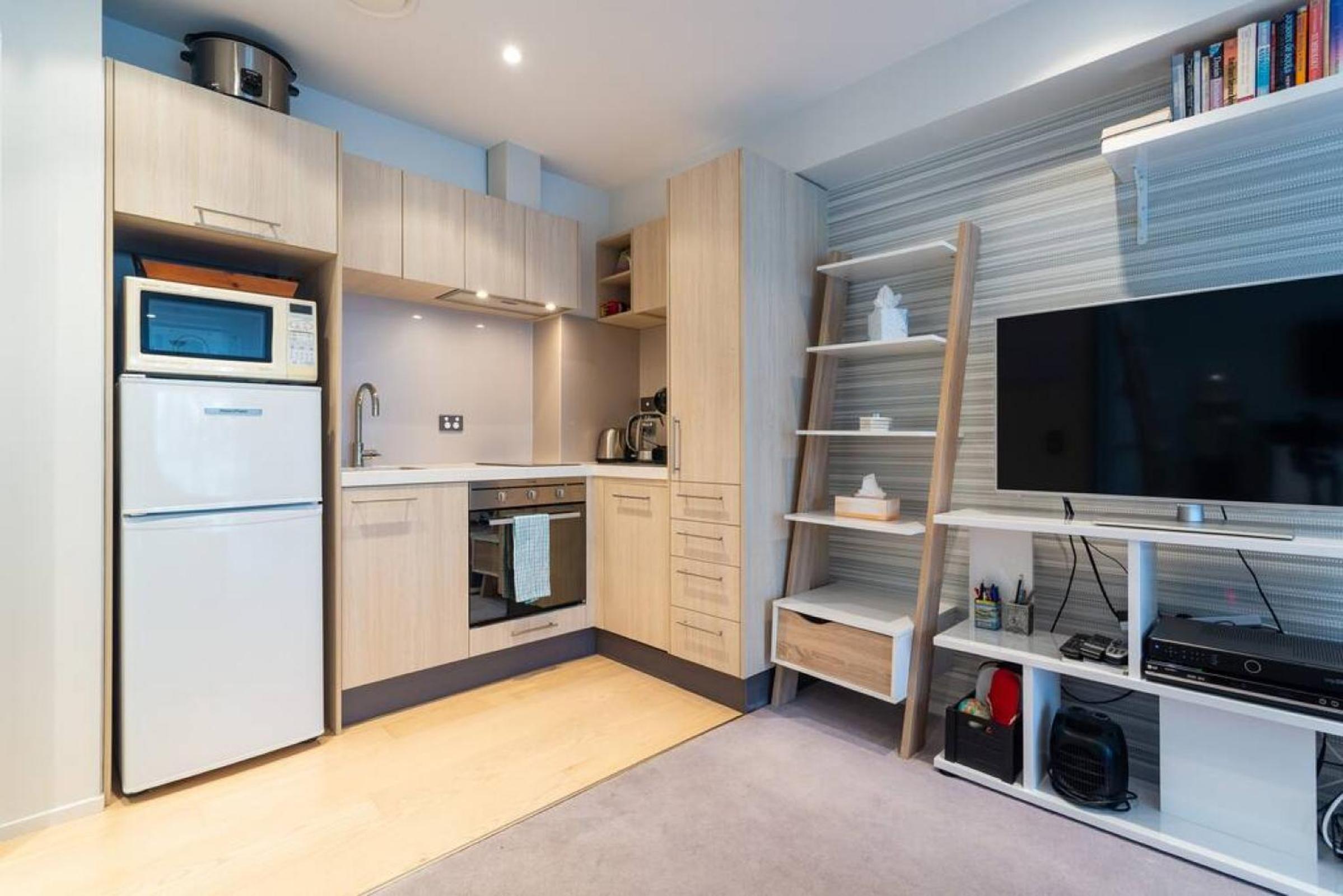 Pristine inner-city nest with carpark view 2