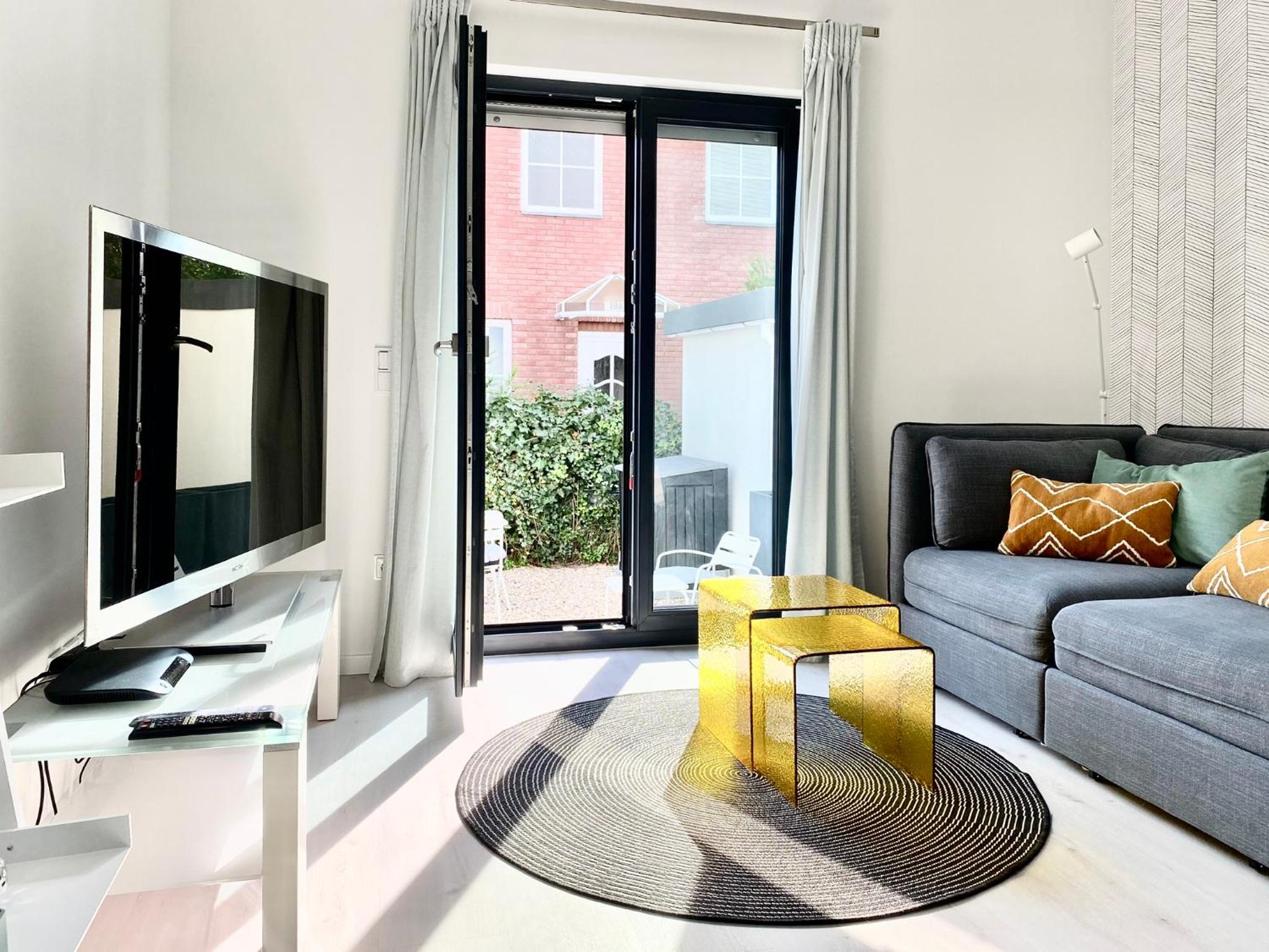 modernes Apartment, Terrasse und Garten am Lilienthalpark im Südwesten Berlins
