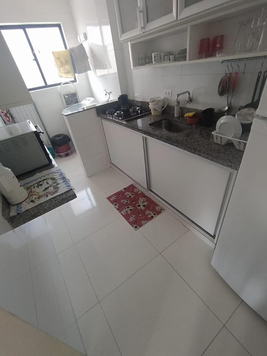 Apartamento Enseada Guarujá con piscina en Guarujá — kitchen