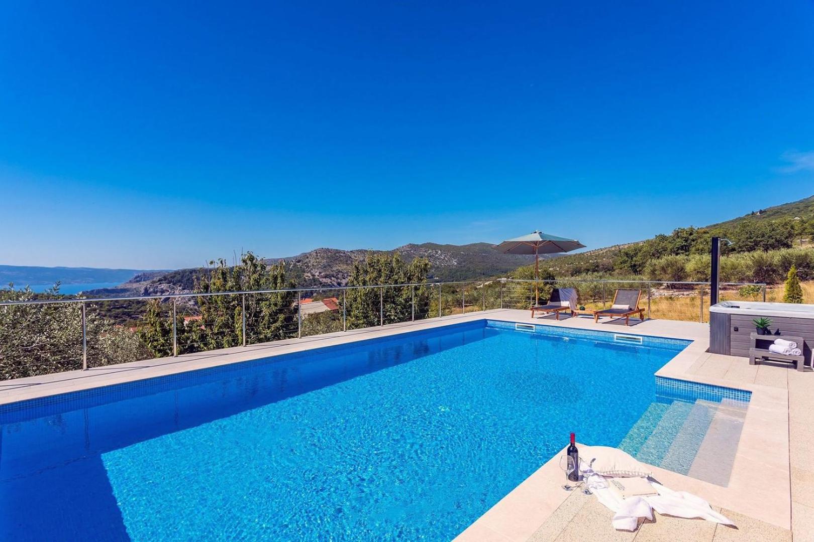 Villa Flora with a 53 sqm private pool with Cinema room with projector and 4 en-suite bedrooms view 5
