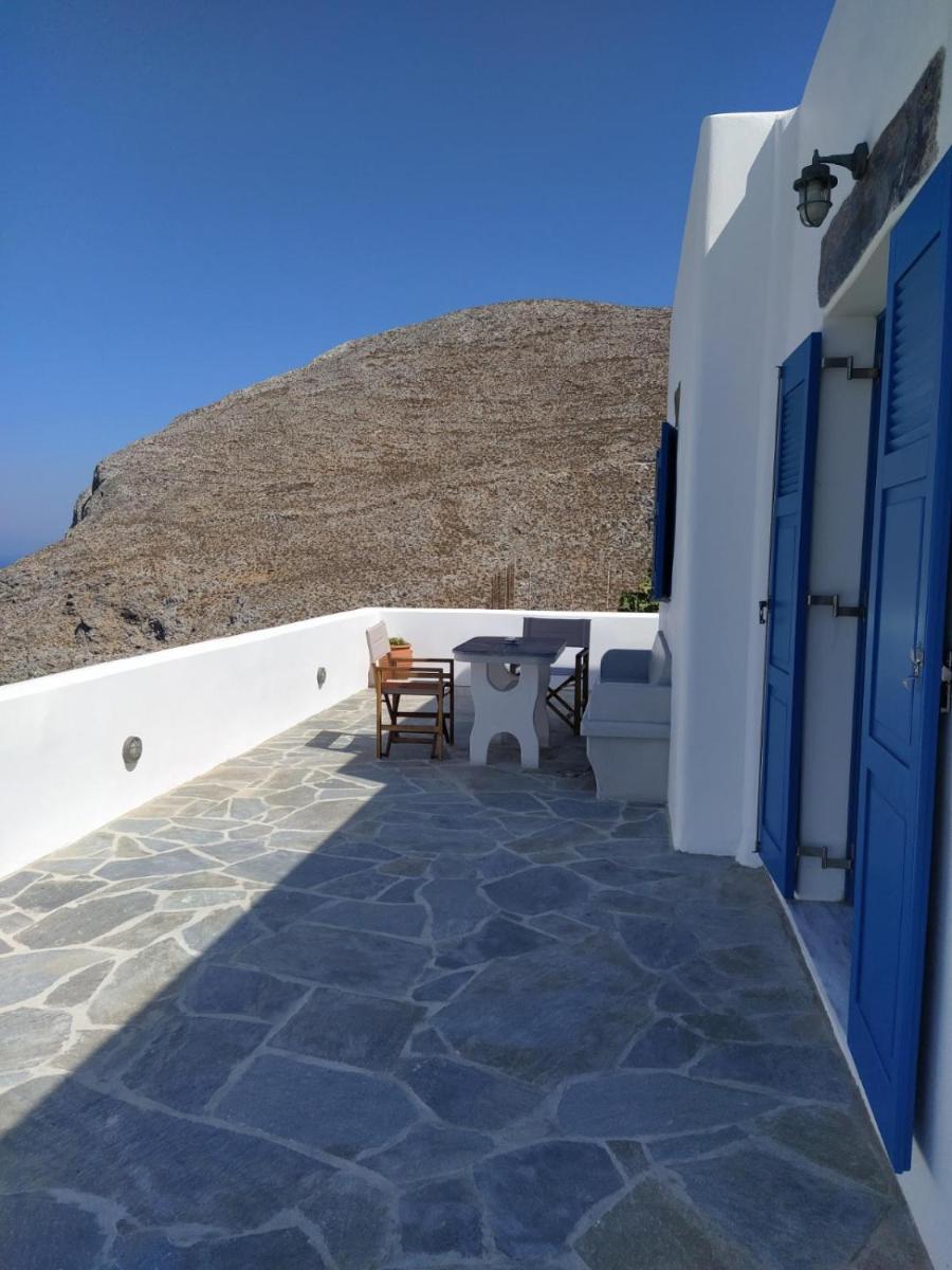 Cycladic houses in rural surrounding photo 5