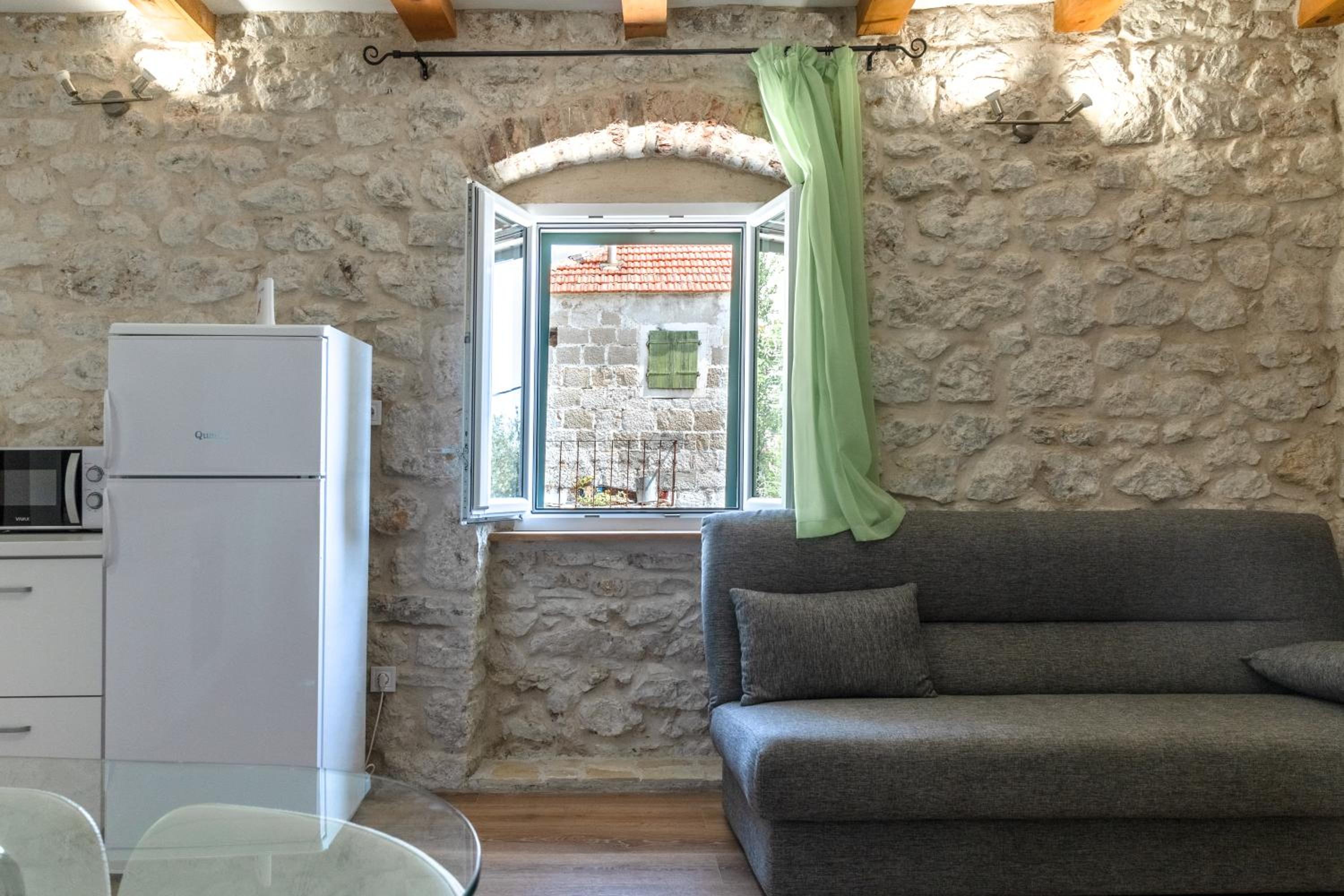 Stone house Dario with Finnish sauna and an outdoor hot tub view 5