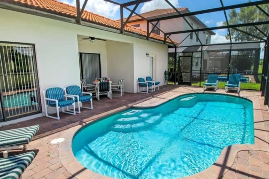 Serene 4-Bedroom Lakeview Retreat with South-Facing Pool & Sun-Drenched Outdoor Living