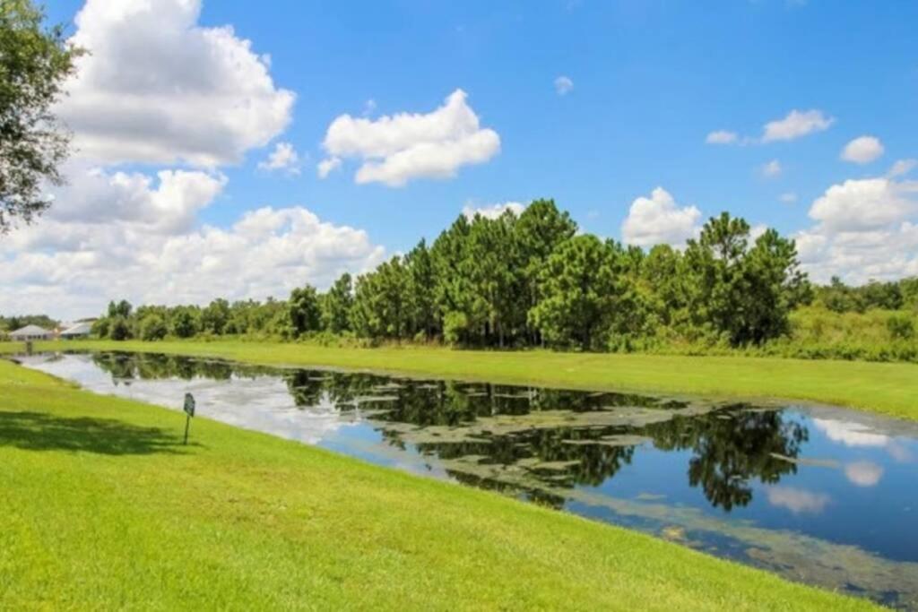 Serene 4-Bedroom Lakeview Retreat with South-Facing Pool & Sun-Drenched Outdoor Living