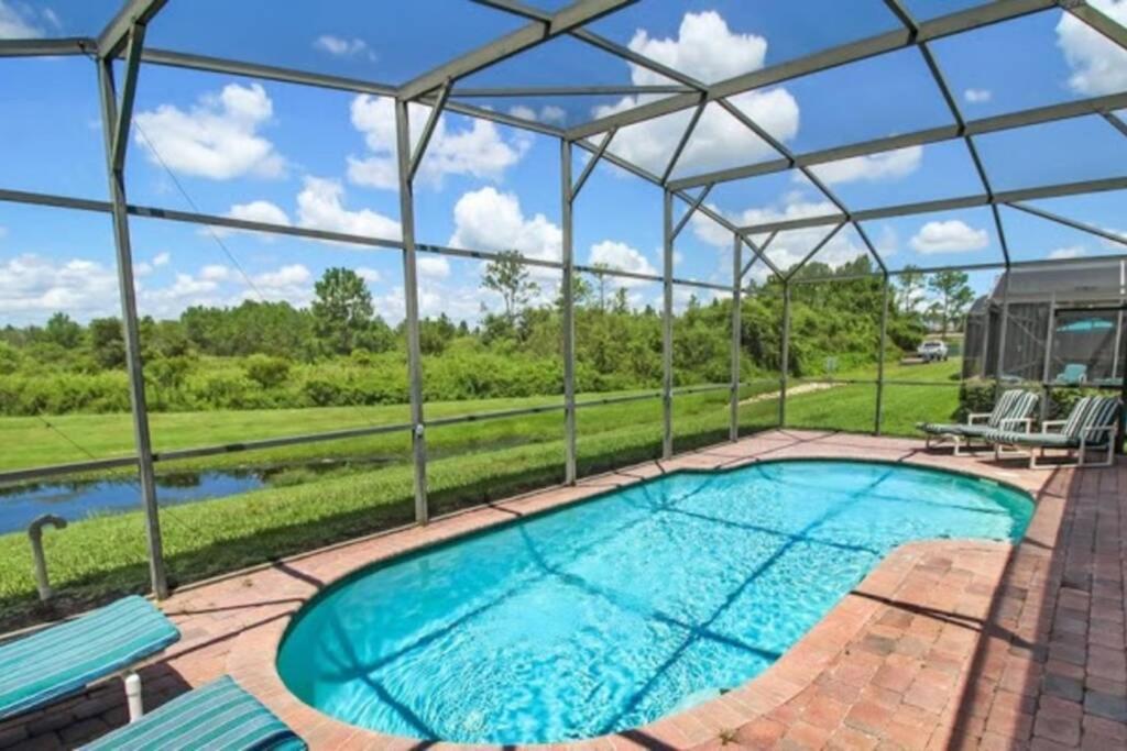 Serene 4-Bedroom Lakeview Retreat with South-Facing Pool & Sun-Drenched Outdoor Living